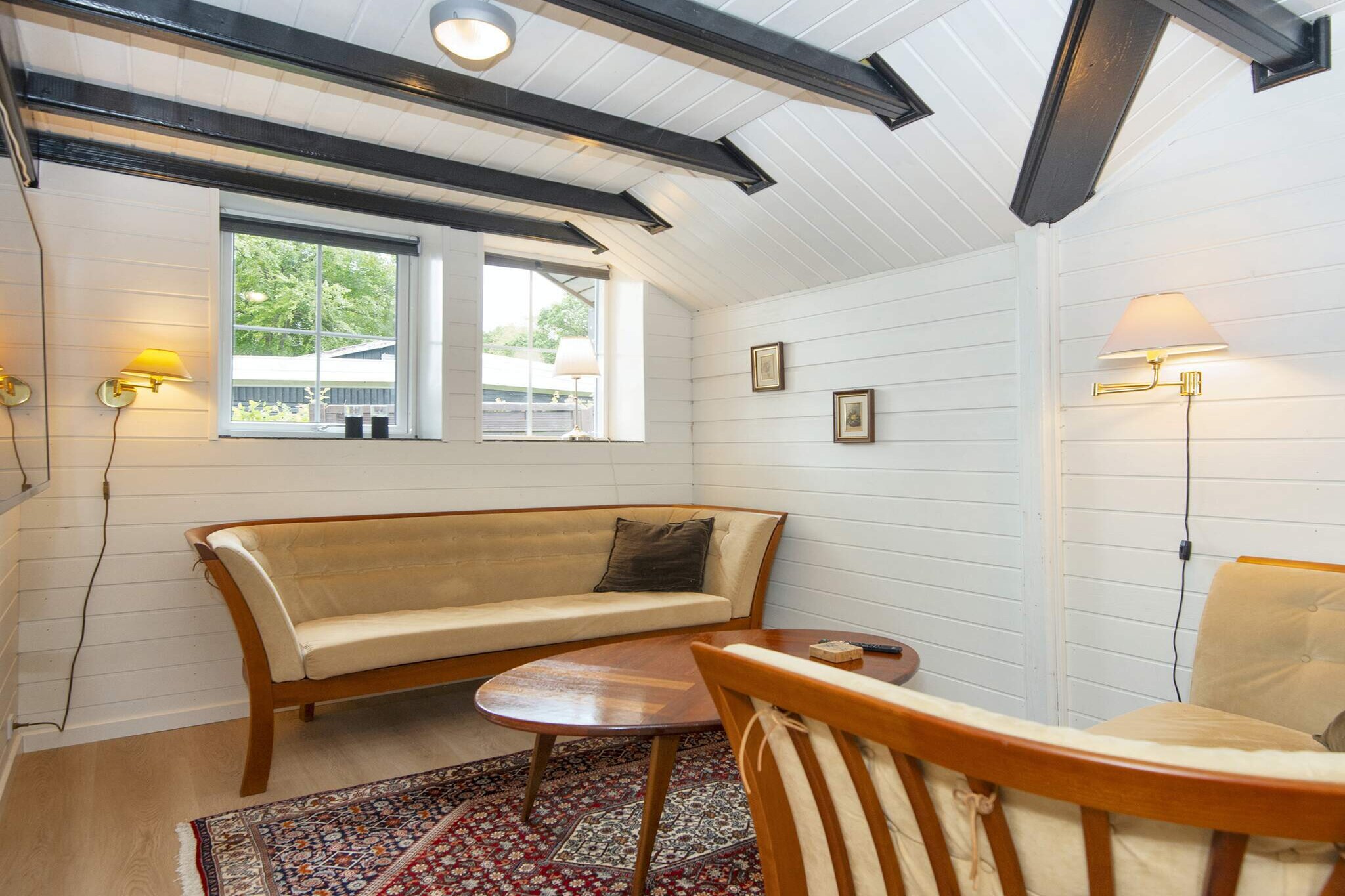 open kitchen(cooker(electric), hood, coffee machine, microwave, dishwasher, fridge, freezer(60-99L)), Living/bed room(TV(cable, german television channels, danish TV channels (DR1 and TV2)), CD player, stereo unit), bedroom(double bed), bedroom(double bed), bathroom(floor heating)(tumble dryer, bathtub or shower, washbasin, toilet, washing machine), bathroom(floor heating)(bathtub or shower, washbasin, toilet), mezzanine(4x single folding bed), conservatory, Bubble bath(indoor, heated, 2 persons), heating(electric), terrace, terrace(roofed), garden, BBQ, fish cleaning table, air to air heatpump