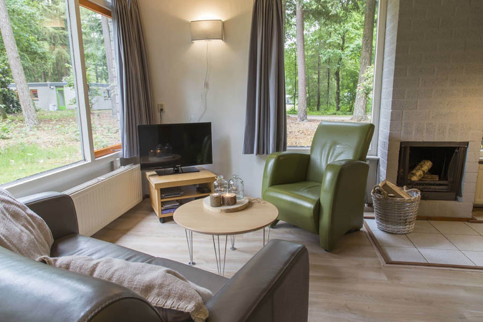 Tidy bungalow with fireplace located in the Veluwe