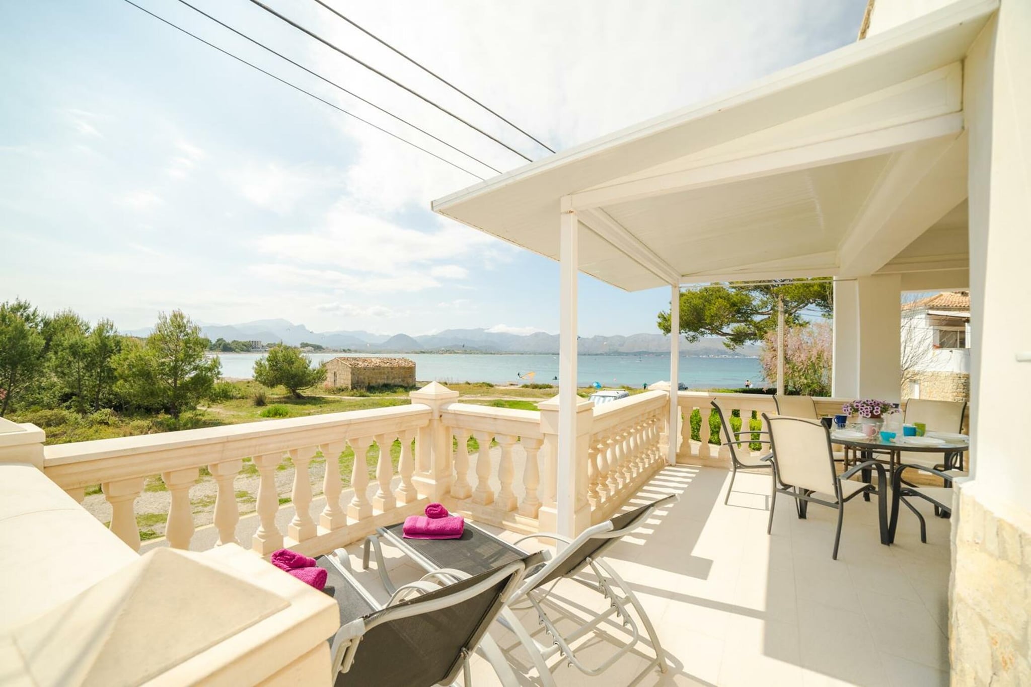 Relaxed Coastal Living
Wake up to sweeping views of the Bay of Pollensa from your private terrace in this bright ground-floor apartment. Designed for families and groups of up to six, the home features three comfortable bedrooms and two modern bathrooms. The open living-dining space creates a welcoming spot to gather, while the fully equipped kitchen—with oven, microwave, dishwasher, and ceramic hob—makes preparing meals easy. End the day outdoors with a charcoal barbecue and the sound of the sea as your backdrop.
Ideal Alcúdia Location
Just 1.2 km away, the historic town of Alcúdia invites you to wander through charming cobbled streets and admire the medieval walls that surround the old town. Whether you’re exploring local markets or picking up essentials at Eroski supermarket only 2 km away, everything you need is within reach. With sun loungers ready on the terrace, you can balance sightseeing with moments of calm, soaking in the views of Mallorca’s north coast.
Dining and Discovery
A short 3 km drive takes you to a variety of restaurants serving authentic Mallorcan flavors and fresh seafood. For those eager to explore further, the island’s capital, Palma, is easily accessible, and the airport is 48 km away. Spend mornings on the terrace, afternoons at nearby beaches, and evenings discovering local dining spots before returning to the comfort of your seaside retreat. Please note: pets are not allowed.