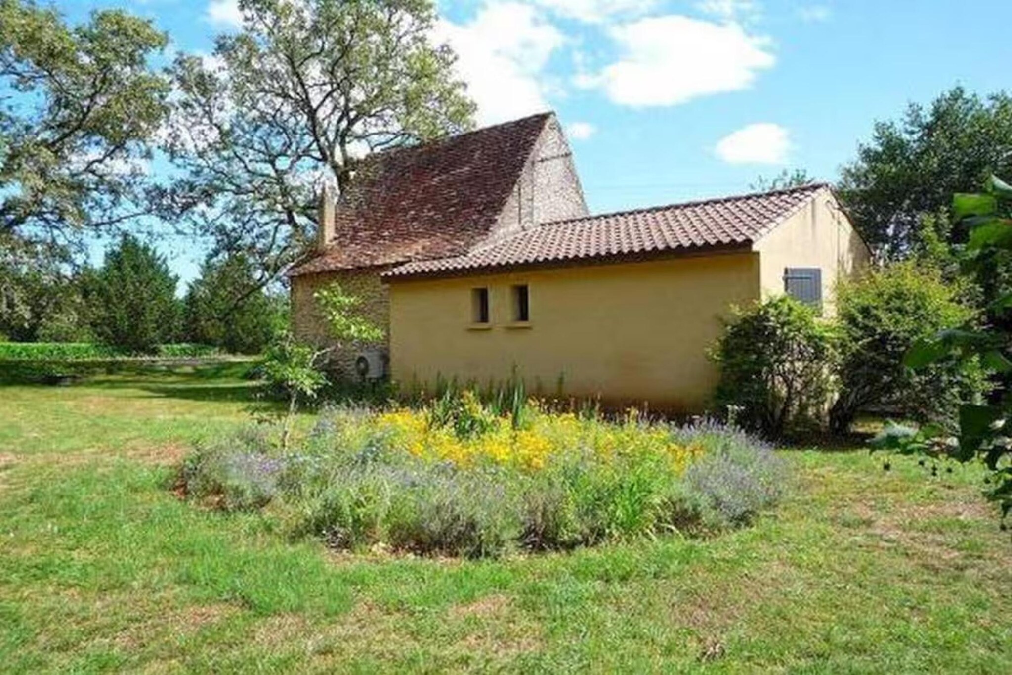 Jolie maison le Catalo-Buitenkant zomer