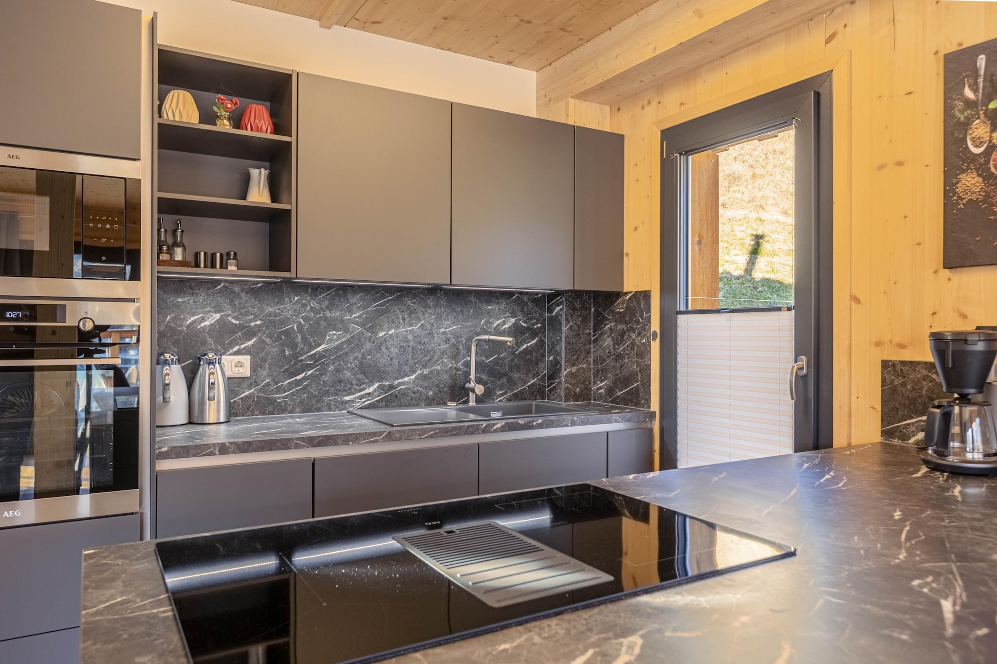 Ground floor: (hallway(ski boot heaters), Living room, open kitchen(cooker(ceramic), oven, microwave, dishwasher, fridge-freezer), bathroom(shower, 2x washbasin, toilet), bathroom(shower, washbasin, washbasin, toilet), Internet access)\n\nOn the 1st floor: (bedroom(double bed), bedroom(double bed), bedroom(double bed), bedroom(double bed, bunk bed), bathroom(shower, sauna, 2x washbasin, toilet))\n\nski storage(shared with other guests), terrace, parking