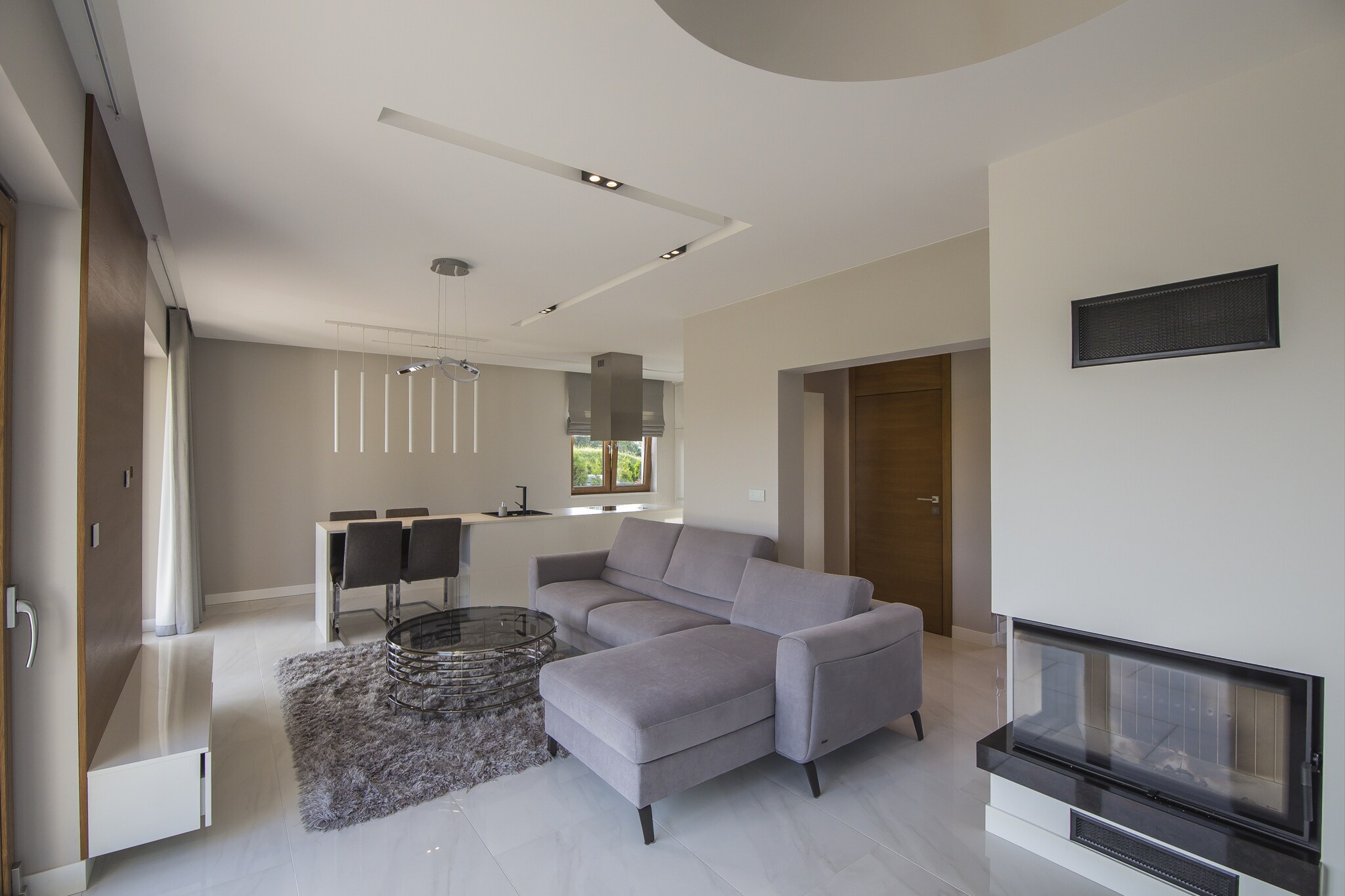 Living room(double sofa bed, TV, fireplace, heating(floor heating)), open kitchen(hob, hood, espresso machine, oven, fridge-freezer), bedroom(double bed), bedroom(double bed), bathroom(shower, washbasin, toilet), toilet, garage, terrace, garden