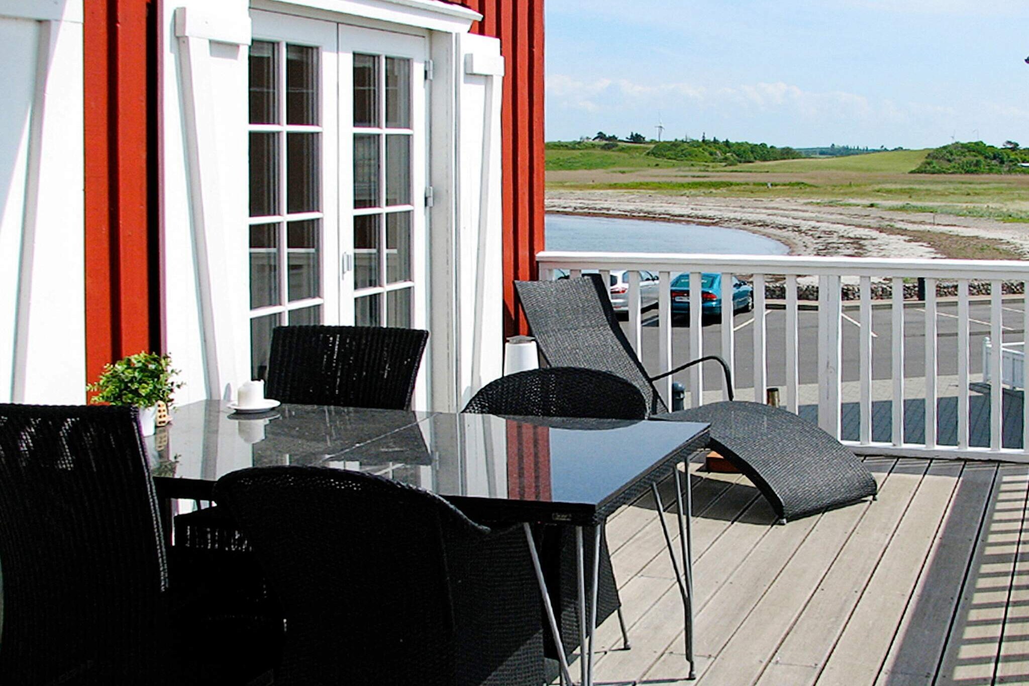 open kitchen(cooker(electric), hood, coffee machine, microwave, dishwasher, fridge, freezer(60-99L), freezer(140-199L)), Living/bed room(TV(cable, german television channels, danish TV channels (DR1 and TV2)), CD player, stereo unit), bedroom(2x single bed), bedroom(2x single bed), bedroom(2x single bed), bathroom(floor heating)(tumble dryer, bathtub or shower, washbasin, toilet, washing machine), bathroom(floor heating)(bathtub or shower, washbasin, toilet), Bubble bath(indoor, heated, 2 persons), sauna(indoor, heated, 3 persons), balcony, terrace, BBQ, fish cleaning table