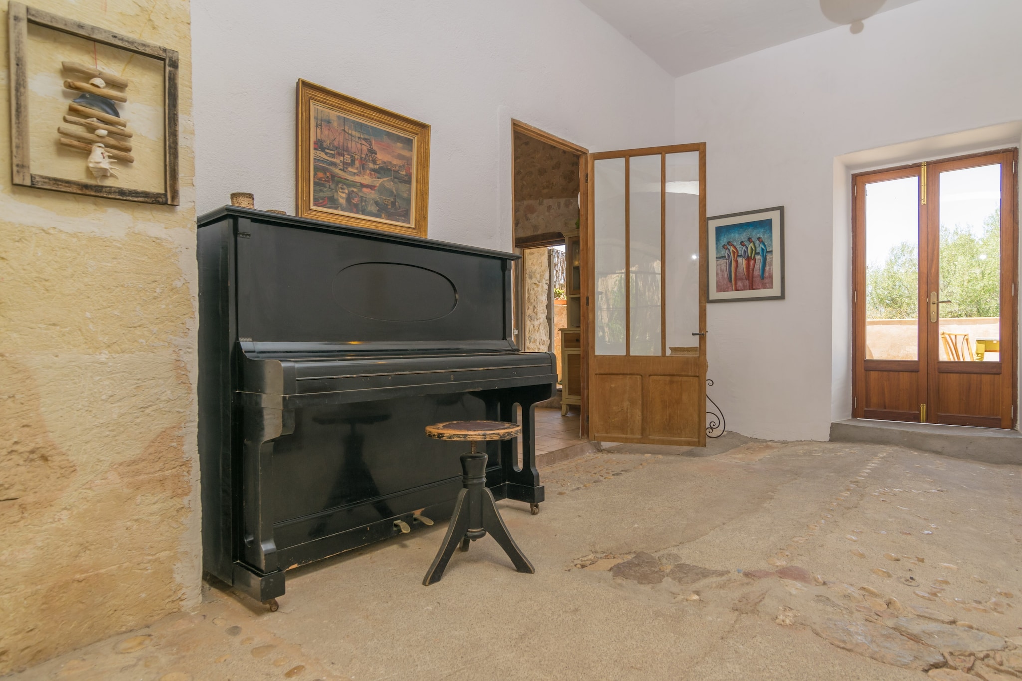 The exterior area of this finca offers the opportunity to know an authentic Majorcan country house. The rustic construction, surrounded by pure nature, boasts beautiful corners where you can spend nice moments. The artificial lawn area is perfect to bask in the sun on one of the 2 sunloungers  or to enjoy the jacuzzi that can be heated up to 24ºC. Then, you will find several terraces where you can enjoy a glass of wine, a good reading or a family meal or with friends. There are neighbours around.

Upon entering the house, you will find a living room, a kitchen-dining room equipped with a gas stove, and a bathroom with a bathtub. Going up the stairs, you will find the living room, equipped with a TV and air conditioning, the two bedrooms, both with two single beds and a wardrobe, and a second bathroom with a shower. One of the bedrooms has air conditioning and space to set up a cot and high chair. There is a washing machine, iron and ironing board. Fans and a heater are also available.

The accommodation is located 6 km away from the town of Manacor where you will find all kinds of services like bars, restaurants, shops, supermarkets and much more. In addition, you will have an easy access to the southern paradisaical beaches and coves like Cala Romántica, only 17.6 km away, and many others. Note: This accommodation is intended for families and guests over 30 years old who are looking for a peaceful stay. Bookings for parties or celebrations are not accepted. A copy of the identification document of all guests will be required to confirm the reservation.  Consult the advertiser for possible charges. Pets are not allowed. The holding of events is forbidden. There is exterior parking for 2 cars.  
Distances
Beach: 17.6 km - Cala Romàntica
Airport: 53.4 km - Son Sant Joan
Golf course: 12 km - La reserva Rotana Golf
Town: 6 km - Manacor
Train station: 7.6 km - Manacor
Bus stop: 7.6 km - Manacor
Ferry: 47.5 km - Puerto de Alcúdia
Hospital: 7.6 km - Hospital Manacor
Tourist license: ETV/13896Single Rental Registry: ESFCTU0000070230008460200000000000000000000ETV/138967The Ecotasa (tourist tax) must be paid cash on site when checking in. The amount varies between 0.55€/night and guest during the low season and 2.2€/night and guest during  the high season. The tax is reduced by half from the 9th day of your stay. All guests have to pay the Ecotasa, except people under 16 years. You will have to pay the deposit amount at the arrival to the owner.