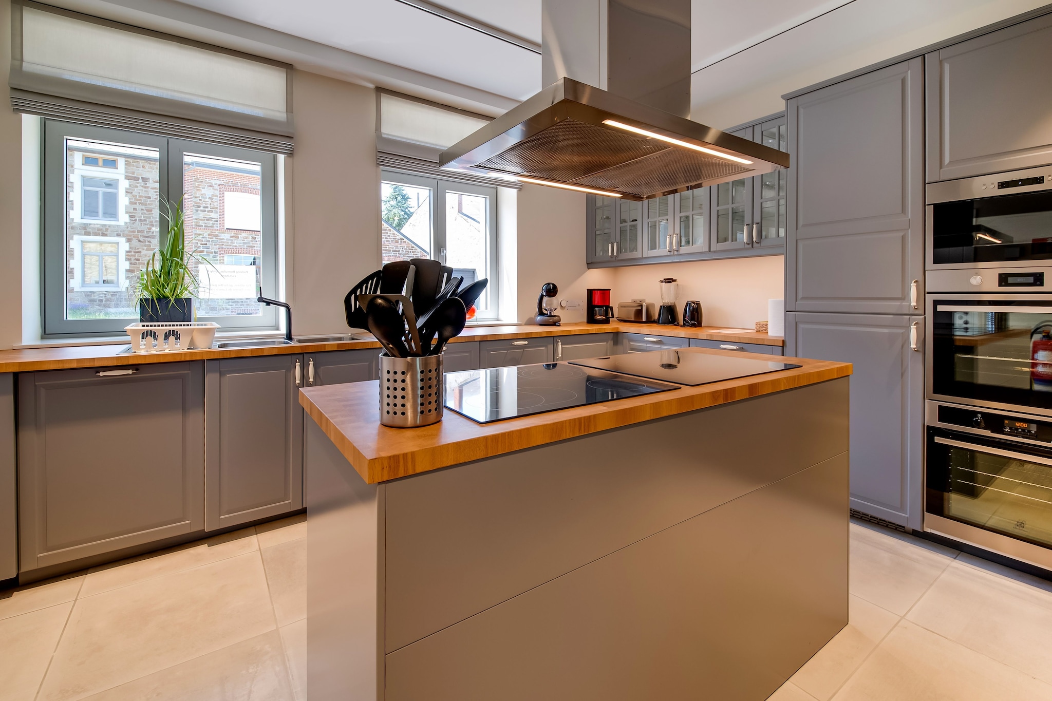 Ground floor: (Entrance, hallway, Sitting room(sitting room with fireplace, TV(flatscreen, digital), stove(wood), seating area(20 persons), stereo unit), dining room(dining table(20 persons)), open kitchen(electric kettle, toaster, 2x cooker(4 ring stoves, ceramic), hood, coffee machine, espresso machine, 2x oven(grill-oven), microwave, 2x dishwasher, 2x fridge, freezer, Juicer, Hand blender), sanitary facility(washbasin, toilet), sanitary facility(washbasin, toilet))\n\nOn the 1st floor: (Bedroom with bathroom(double bed(boxspring, twin blanket, twin fitted sheet), shower, washbasin, toilet, hairdryer), Bedroom with bathroom(double bed(boxspring, twin duvet, twin fitted sheet), shower, washbasin, toilet), Bedroom with bathroom(double bed(boxspring, twin duvet, twin fitted sheet), shower, washbasin, toilet, hairdryer), Bedroom with bathroom(double bed(boxspring, twin duvet, twin fitted sheet), shower, washbasin, toilet), Bedroom with bathroom(double bed(boxspring, twin duvet, twin fitted sheet), shower, washbasin, toilet), Bedroom with bathroom(double bed(boxspring, twin duvet, twin fitted sheet), shower, washbasin, toilet), Bedroom with bathroom(double bed(boxspring, twin duvet, twin fitted sheet), shower, washbasin, toilet), sanitary facility(washbasin, toilet), sanitary facility(washbasin, toilet), shared room)\n\nOn the 2nd floor: (Bedroom with bathroom(6x single bed(duvet, fitted sheet, boxspring), 2x shower, 2x washbasin, toilet), recreation room(TV(flatscreen, digital), play equipment, table football))\n\nterrace(shared with other guests, roofed, 25 m2), terrace(private, 70 m2), garden(shared with other guests, landscaped garden, partially fenced), garden furniture, BBQ, parking, boules court, slide, Swing set