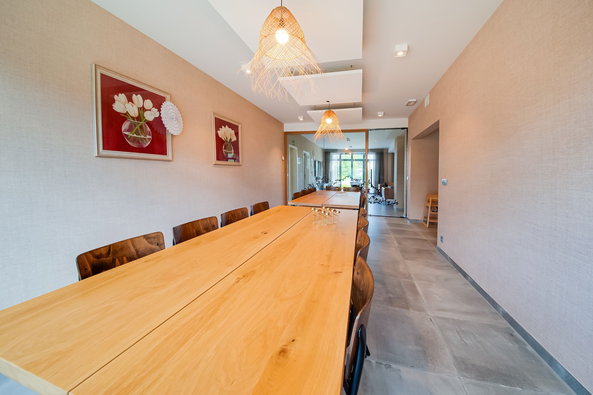 Ground floor: (Entrance, hallway, Sitting room(sitting room with fireplace, TV(flatscreen, digital), stove(wood), seating area(20 persons), stereo unit), dining room(dining table(20 persons)), open kitchen(electric kettle, toaster, 2x cooker(4 ring stoves, ceramic), hood, coffee machine, espresso machine, 2x oven(grill-oven), microwave, 2x dishwasher, 2x fridge, freezer, Juicer, Hand blender), Bedroom with bathroom(double bed(twin duvet, twin fitted sheet), shower, washbasin, toilet), sanitary facility(washbasin, toilet), sanitary facility(washbasin, toilet), recreation room(billiards))\n\nOn the 1st floor: (Bedroom with bathroom(double bed(boxspring, twin duvet, twin fitted sheet), shower, washbasin, toilet), Bedroom with bathroom(double bed(boxspring, twin duvet, twin fitted sheet), shower, washbasin, toilet), Bedroom with bathroom(double bed(boxspring, twin duvet, twin fitted sheet), shower, washbasin, toilet), Bedroom with bathroom(double bed(boxspring, twin duvet, twin fitted sheet), shower, washbasin, toilet), Bedroom with bathroom(double bed(boxspring, twin duvet, twin fitted sheet), shower, washbasin, toilet), Bedroom with bathroom(double bed(boxspring, twin duvet, twin fitted sheet), shower, washbasin, toilet), sanitary facility(washbasin, toilet), sanitary facility(washbasin, toilet), shared room(seating area(6 persons)))\n\nOn the 2nd floor: (Bedroom with bathroom(6x single bed(duvet, fitted sheet, boxspring), 2x shower, 2x washbasin, toilet))\n\nfireplace, bathtub or shower, washing machine, terrace(shared with other guests, roofed, 25 m2), terrace(private, 40 m2), garden(shared with other guests, landscaped garden, partially fenced), bicycle storage, garden furniture, BBQ, parking, deckchairs, parasol, boules court, slide, children\'s bed, ironing board, Swing set