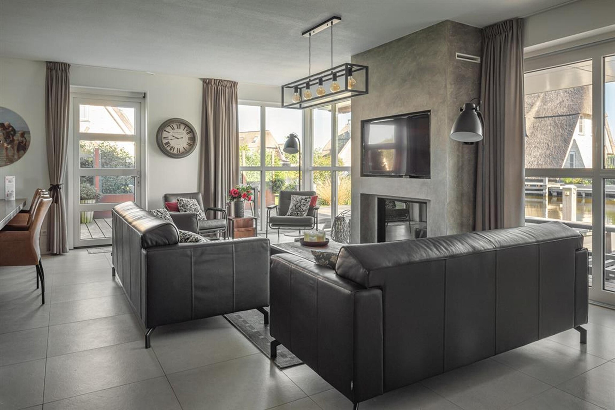 Welcome to your modern lakeside villa in the heart of Frieslandâ€”perfect for families or groups seeking a stylish escape. This thoughtfully furnished retreat features a spacious living area with a cozy gas fireplace, a sleek kitchen-diner with two fridges, and a large dining table ideal for shared meals and laughter. Whether you're cooking together or lounging in the private TV room with sliding doors, every corner of the villa offers both connection and privacy. High-end finishes and smart touches ensure your comfort from the moment you arrive.

Upstairs, youâ€™ll find three beautifully appointed bedrooms, each with its own en-suite bathroom and smart TV. One includes a sun shower for a spa-like experience. For extra guests or little adventurers, the charming cupboard bed on the landing adds a touch of whimsy. With underfloor heating, modern appliances including a washer and dryer, and serene waterfront views, every detail is designed for easy living and restful nights.

Step out onto the expansive waterfront terrace, fully furnished with a dining set, loungers, and a cozy lounge corner. Moor your own or rented boat right outside the villa and explore the Frisian Lakes with ease. Located in peaceful Delfstrahuizen, you're just minutes from local gems like EetcafÃ© de Ulesprong and fine dining at Restaurant Tjeukemeer. Please note: pets are not allowed, making this the perfect sanctuary for guests with allergies or seeking a serene, fur-free stay.