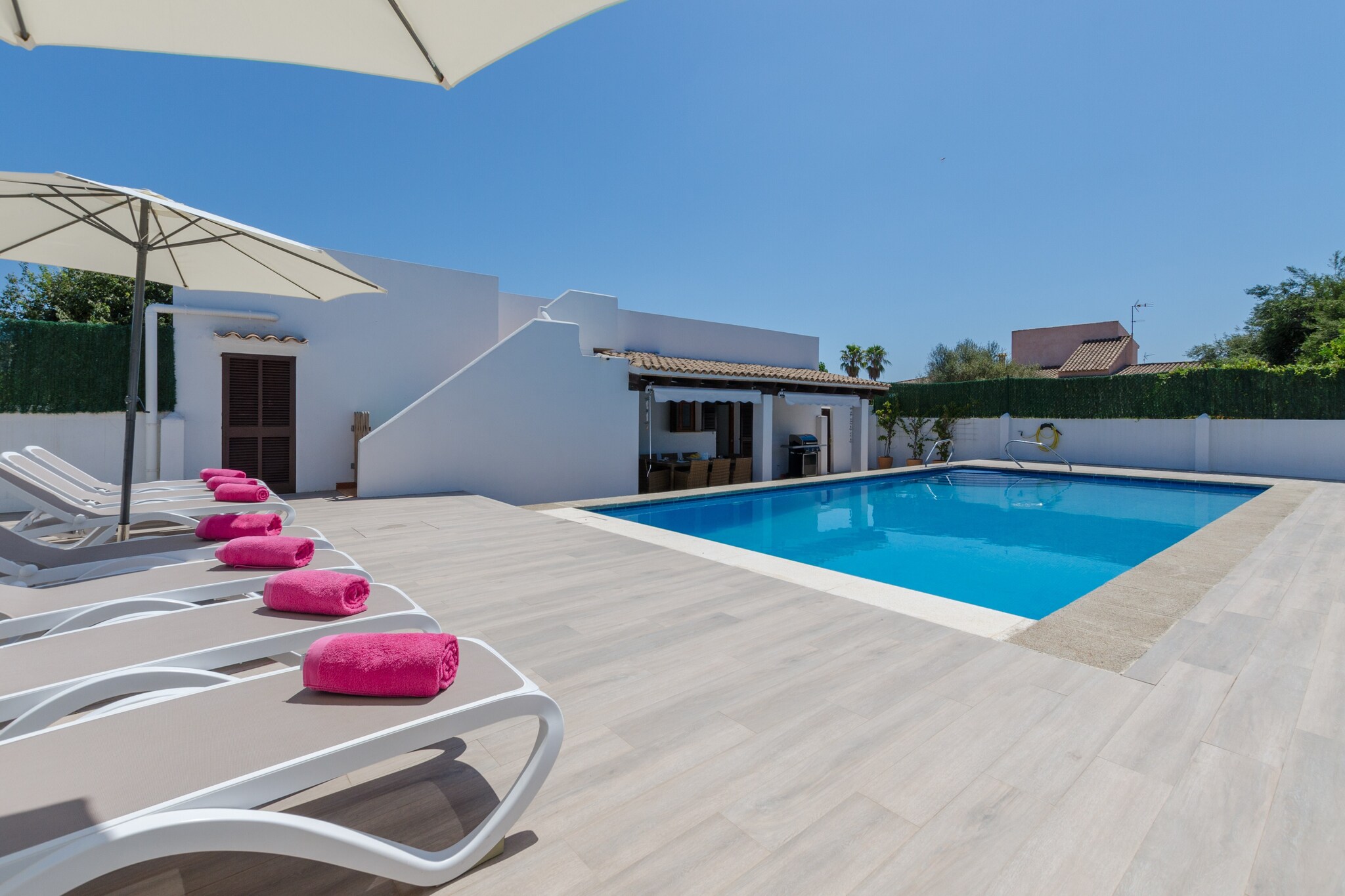 This beautiful coastal house is a marvel. It is located at a short walk from the beach and its exteriors are ideal. At the back of the building, there is a big salt private pool, - 10 x 5 m and 1 to 2.2 m depth -, with 8 sun loungers and a fantastic furnished porch ready for your best barbecues. And, at the front of the house, there is a lawn area that surrounds an amazing terrace where to get relaxed.

Inside the house, there is a large living-dining room, with TV-SAT, air conditioning and chimney. Immediately after, you gain access to the kitchen, with induction hob and a dining table with chairs and benches. The laundry is provided with washing machine, iron and ironing board. There are 4 dormitories with A/C, of which two of them feature two single beds and wardrobe, while another one has a double bed, an en-suite bathroom with shower and cot/high chair and, finally, the fourth one has a bunk bed. All four have fan (3 of them are ceiling ones). There are two more bathroom with shower at the house as well.

The accommodation is located in the coastal urbanisation known as Sa Coma, at only 600 meters from the beach in addition to offer a whole range of services in its surroundings as, for instance, bars, restaurants, supermarkets, leisure, etc. The golf course of Son Servera is also in the nearby, at 9.6 km.

The air conditioning of the living-dining room runs from 2 pm to 7 pm and the ones that are in the bedrooms run from 10 pm to 7 am. Note: This accommodation is intended for families and guests over 25 years old who are looking for a peaceful stay. Bookings for parties or celebrations are not accepted. A copy of the identification document of all guests will be required to confirm the reservation.  Consult the advertiser for possible charges. Pets are not allowed. The holding of events is forbidden. There is exterior parking for 2 cars.  
Distances
Beach: 0.600 km - Sa Coma
Airport: 69.3 km - Son Sant Joan
Golf course: 9.6 km - Club golf Son Servera
Town: 0 km - Sa Coma
Train station: 19.8 km - Estación de Manacor
Bus stop: 0.45 km - Avinguda de les Savines, 148, Sa Coma 
Ferry: 51.6 km - Puerto de Alcúdia
Hospital: 18.7 km - Hospital de Manacor
Tourist license: ETV/7653Single Rental Registry: ESFCTU00000702300036137000000000000000000000ETV/76535There's a mandatory tourist tax in Balearic Islands, called Ecotasa. All guests, except people under 16 years, have to pay this tax. The amount varies between 0.55€/night and guest during the low season and 2.2€/night and guest during  the high season .The tax is reduced by half from the 9th day for your stay. You will have to pay the deposit amount at the arrival to the owner.Homerti - Central de Reservas CR/33