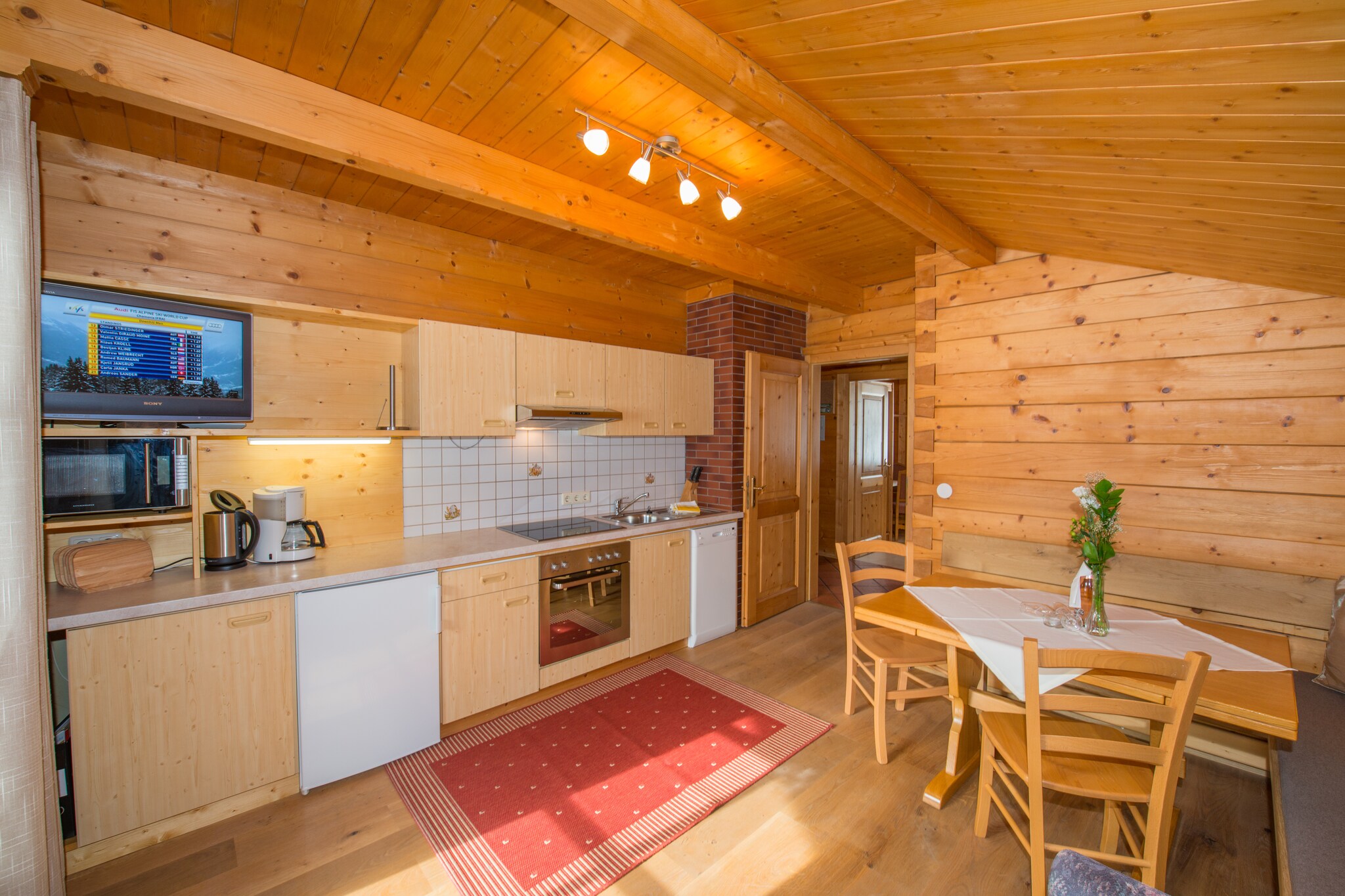 Appartment Holzblockhaus-Keuken