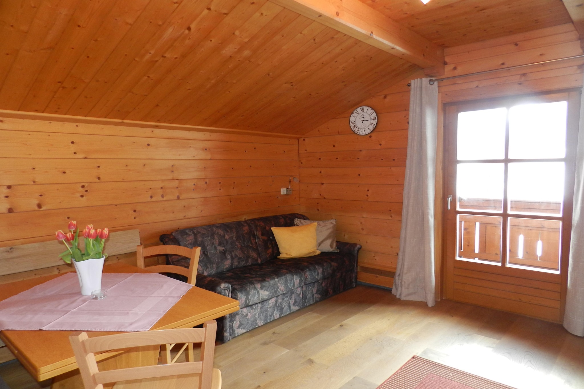Appartment Holzblockhaus - Woonkamer