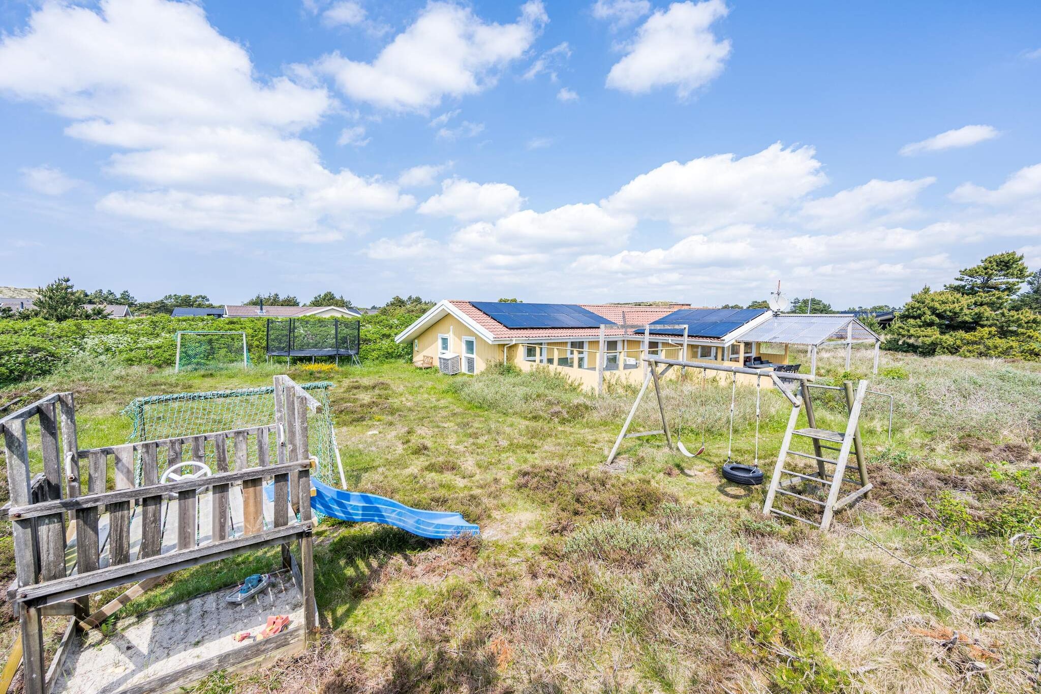 Internet Access DSL, open kitchen(cooker(electric), coffee machine, microwave, dishwasher, fridge, freezer(1-59L)), Living/bed room(DVD player, Blu-ray player, radio, CD player, cot, high chair), bedroom(double bed, solar energy), bedroom(double bed, TV(antenna, german television channels)), bedroom(2x single bed), bedroom(2x single bed), bathroom(floor heating)(washbasin, shower, toilet), bathroom(washbasin, shower, toilet), tumble dryer, cot, Bubble bath(indoor, heated, 3 persons), solarium, sauna(indoor, heated), washing machine, heating(electric), terrace, terrace(roofed), garden furniture, BBQ, swimming pool(indoor, heated), play equipment, high chair, air to air heatpump, air to water heatpump