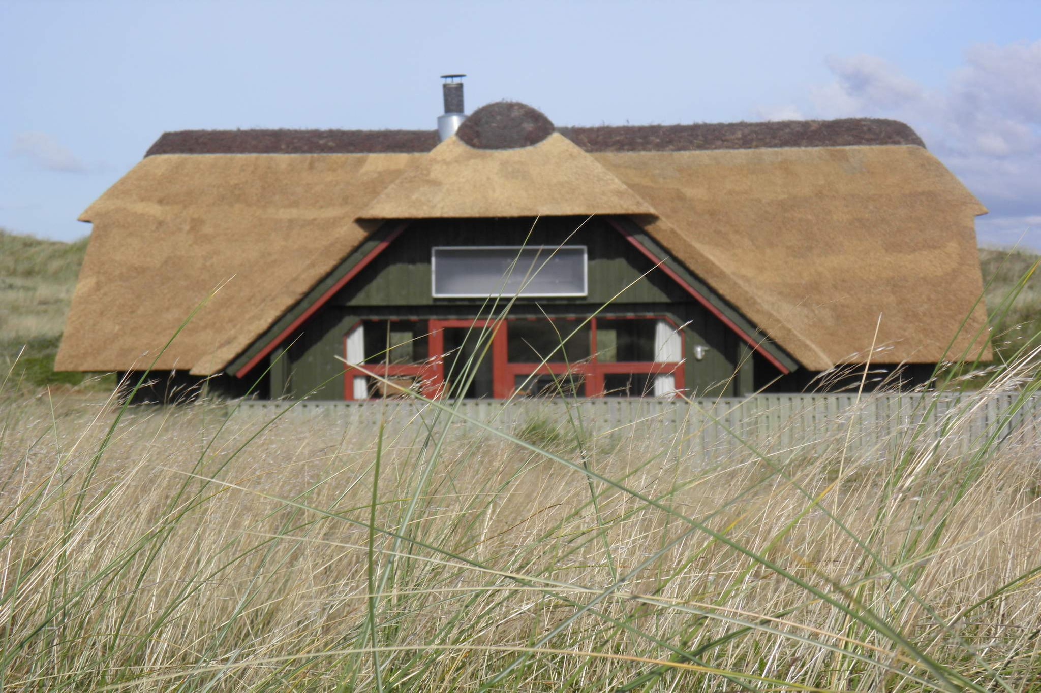 MAX 1 DOG - NO YOUTH GROUPS This lovely holiday home is located on a fantastic heath-covered natural plot of over 6000 m2, offering a beautiful view of Blåvand Lighthouse. The house has a lovely kitchen, which is open to a super cosy living room with a wood-burning stove that provides both warmth and cosiness. From the living room, there is access to a lovely terrace where you can enjoy barbecuing and sunbathing. The holiday home has three good bedrooms, two of which have double beds. The last room has a single bed. Lovely bathroom with shower and access to sauna. The house's living room has wooden floors - the rest of the house has tiled floors, which are heated with solar hot air and a heat pump. If you love the great outdoors and the feeling of freedom, this is the house for you. Free final cleaning!A refundable deposit might be charged closer to your check-in date. The security deposit ensures a smooth stay and covers any additional services or consumption charges.This deposit covers utilities consumed during your stay and any additional services that may be taken.The final amount will be adjusted based on actual meter readings, actual usage of extra services, and any remaining balance will be refunded within 21 days after checkout.This deposit simply acts as a prepayment for charges that you would anyways pay for, ensuring a seamless stay and check-out experience.