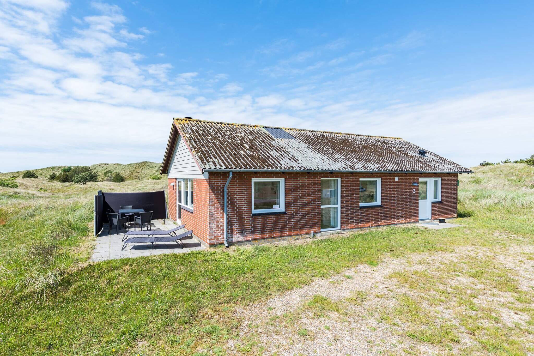 On the most magnificent plot - with the most beautiful view over one of the West Coast's most valuable natural areas - called Værnet - we have a really cozy cottage here. Previously, it was the area's Shepherd's House. The cottage is located as it appears from the old name - a little high, so there is the most beautiful view as far as the eye can see beyond meadows and a true bird paradise. The house is furnished with a bright kitchen in open connection with the living room, where also the wood stove is located. Really cozy on a cold winter day, where the house is also wonderful to holiday in. Both bedrooms are bright and well decorated. From the living room there is access to a small terrace and again with the most amazing views of the meadows with wildlife. An absolutely perfect cottage, if you want peace and quiet, only interrupted by bird chirps, the glacier from a sheep or the cows' & quot; munch & quot ;. However, the cottage is within cycling distance to both Bork Harbor and Nymindegab.