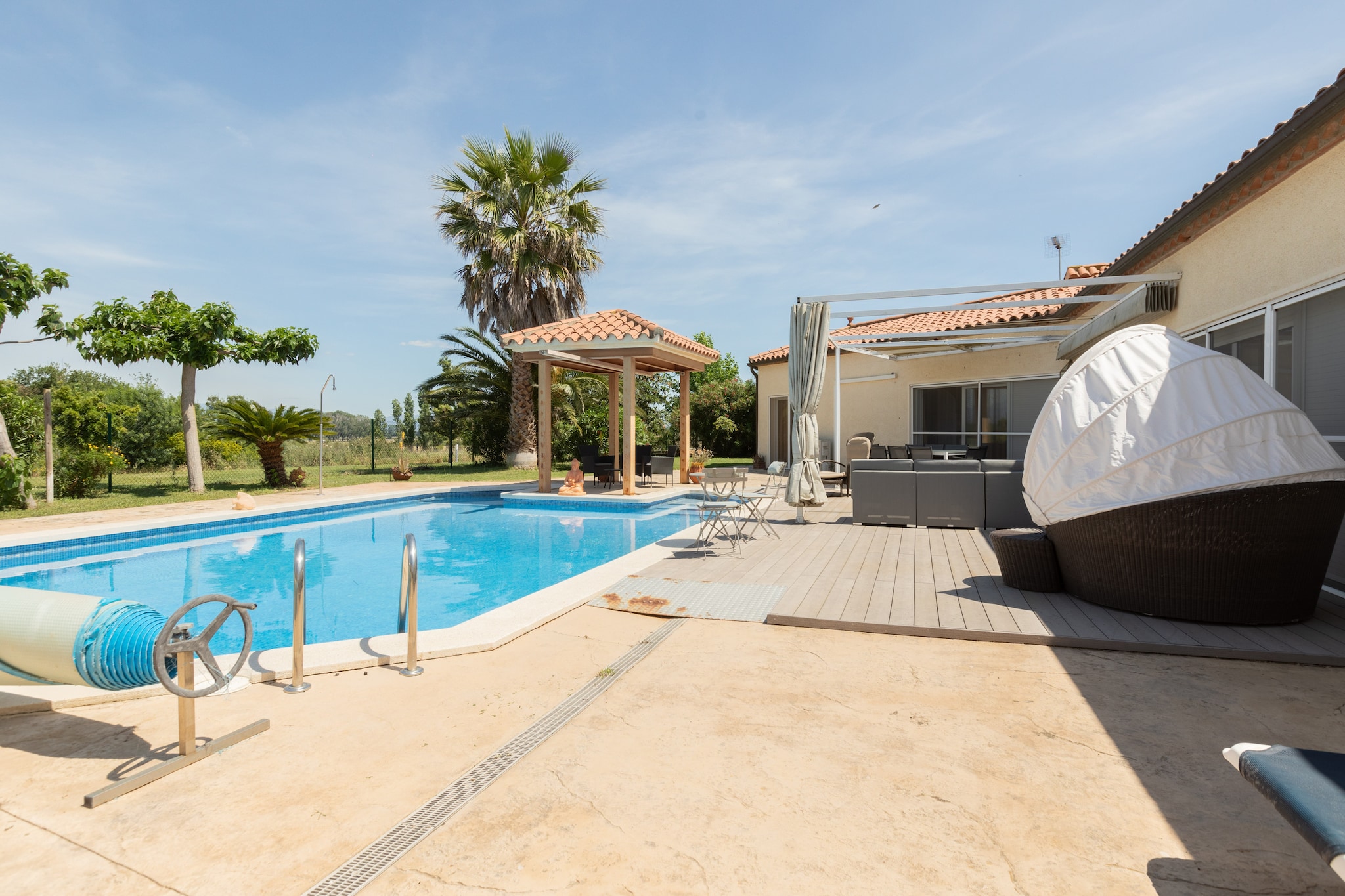 An optional utilities and service fee of EUR 183,00 will be charged before your arrival. Details are given below.<br> Located in Vilacolum, this lavish 3-bedroom villa can host 6 people comfortably. The swimming pool is perfect to take refreshing dips with your family and friends. _x000D_
_x000D_
Chill out at the beach 7 km away and enjoy all the fun-filled activities going around. You can stock your pantry from supermarket at 2 km and try local delicacies from restaurants at 4 km. You can also experience the local culture from the town centre of Figueres,11 km away. _x000D_
_x000D_
The heating and air-conditioning will keep you comfortable during any climate. Prepare delicious grilled barbecues on the terrace and relish it with your favourite beverage while relaxing on the garden furniture. Garden is fenced where your kids can play safely. Washer and Dryer in the laundry room shall help with the laundry services. _x000D_
_x000D_
The nearest airport is 45 km away. _x000D_
_x000D_
Check-in between 4 - 7 PM and check-out between 8 - 10 AM. <br><b> Optional Utilities & Service Package </b><br><b> An optional utilities and service package of EUR 183,00 </b> can be selected prior to your arrival. You will receive a separate communication with the payment link should you wish to include it.<br>This package ensures a seamless stay and conveniently covers services such as final cleaning, utility consumption, service support, and protection against minor damages or incidental costs during your stay.<br>Guests who prefer may manage these services independently, provided the property is returned in good order at check-out.