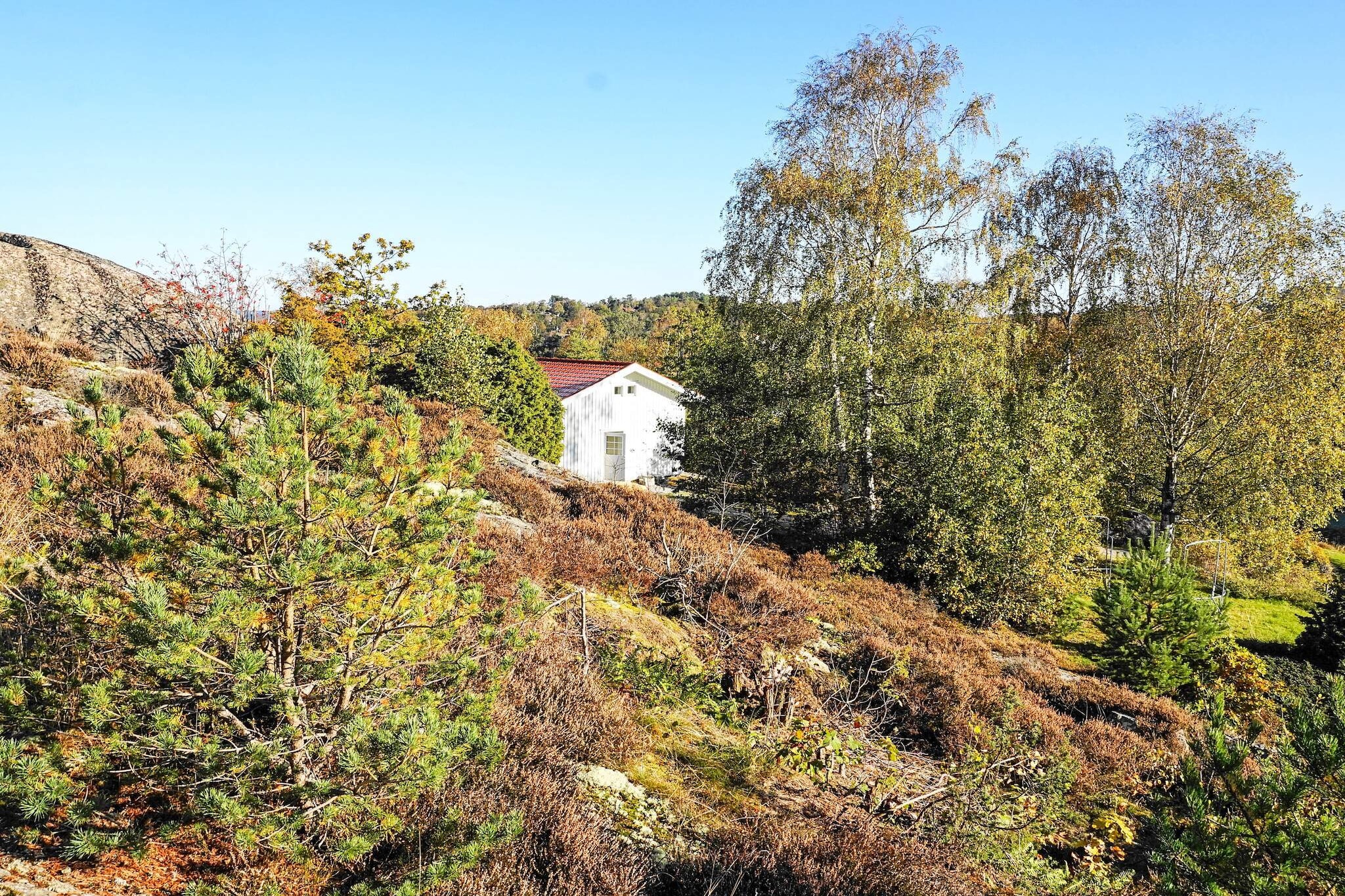 A lovely and airy good standard house, built in 2019. This high location offers beautiful views of the sea and the fjord on northern TjÃ¶rn Island. A wonderful vacation home for those who want to be close to both salty beaches and many attractions. You have a 15 minutes walk down to your morning swim in the sea from a cliff, jetty or beach. Afterwards you may sit down and enjoy breakfast on the newly built balcony while taking in the beautiful views. Watching the sea is like observing a beautiful painting, spectacular regardless of the weather. In the evening you can follow the sun as it sets in the west. Your vacation home located in the countryside on the edge of a nature conservation area with nice hiking trails. There's a good chance to spot both moose and small game passing by. Here you can enjoy both spring, summer and autumn with ease. The owner lives about 30 m from your house and you have your own private and secluded part of the plot. The house maintains a high standard and it is tastefully decorated with lovely material choices. You also get the beautiful view of the sea to go along with the house. The open floor plan combines living room, kitchen and dining area. There's a TV area with a modern family size sofa which can be used as an extra bed, suitable for 2 children. The mezzanine is accessed by stairs and here you'll have a double and a single bed. Freshly tiled bathroom with walk-in shower and washing machine. 4 km away you'll find shop facilities in KÃ¥llekÃ¤rr and the central town of SkÃ¤rhamn which has a large selection of shops, restaurants and the well-known Watercolor Museum. You may experience the archipelago and the small fishing villages around TjÃ¶rn, such as KlÃ¤desholmen and Kyrkesund. Or take the ferry from RÃ¶nnÃ¤ng to the nearby car-free islands of Ã…stol, DyrÃ¶n and TjÃ¶rnekalv. The metropolis of Gothenburg with the popular amusement park Liseberg is about 60 km away.