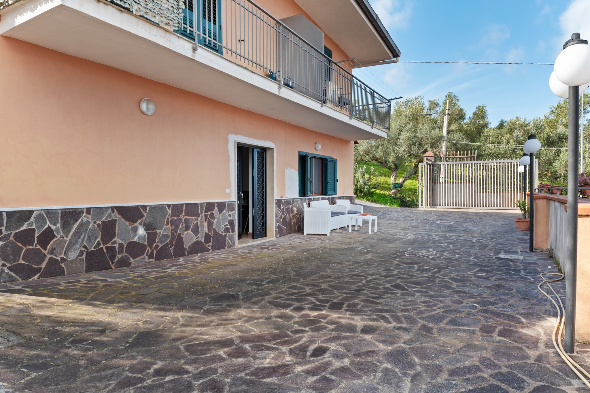 Welcome to this modern abode in Agropoli which is a perfect amalgamation of elegance, modernity and comfort. This apartment with 3 bedrooms can host 6 guests, generally families with children and groups and has everything from a furnished garden to a courtyard and bicycle storage to a carport.
Restaurants lie only half a km away, so do plan luncheons and family dinners with your loved ones. Post that, you can head to the sea in the vicinity for taking a nice stroll and taking in that perfect dose of sun, sand and the sea. Lido Trentova seabeach lies nearly 4 km away, so you can visit that as well. General supplies also lie at the same distance, so fret not about your daily essentials. The Agropoli city centre nearby will fascinate you with its various avenues.
Sit beside the fireplace or in the courtyard with a nice book, or relax on the patio as you gaze at the sunsets. Both a carport and parking are available to keep your cars safe.
The nearest airport lies 110 km away.
About Belvilla
When you stay in a Belvilla home, you can rest assured of a unique holiday home in ideal surroundings at an attractive price. The portfolio of accommodations consists of more than 40,000-holiday homes in 20 European countries. Interested in a weekend getaway, a summer or winter sports holiday or simply a short break? Do you prefer the coast, the countryside or the mountains? Whatever your preference, there is a Belvilla home to meet your needs, from a cosy gîte for two to a castle big enough for the entire family, from an apartment in the heart of Rome to a cabin in the middle of nowhere, from a simple tree house to a luxury dream villa and from close to home to the other side of Europe.
A Belvilla home gives you the freedom to enjoy breakfast in your pyjamas or continue a good conversation into the morning hours without having to worry about the bar's closing time. Prepare gourmet meals with fresh local ingredients in your own kitchen and take advantage of having your own swimming pool to do as many cannonballs as you want! In other words, you can enjoy complete privacy in your home away from home.