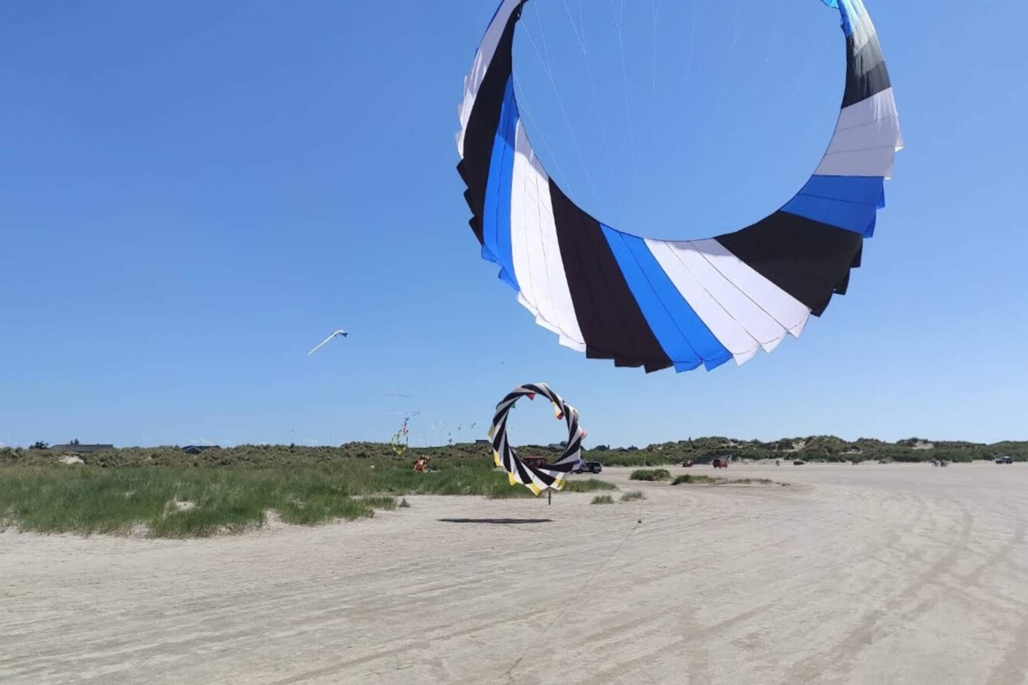 Annex: \n\nInternet Access DSL, open kitchen(cooker(electric), hood, coffee machine, microwave, fridge-freezer), Living/bed room(TV(cable, german television channels, danish TV channels (DR1 and TV2))), bedroom(double bed), bedroom(2x bunk bed), bathroom(bathtub or shower, washbasin, toilet), heating(electric), terrace