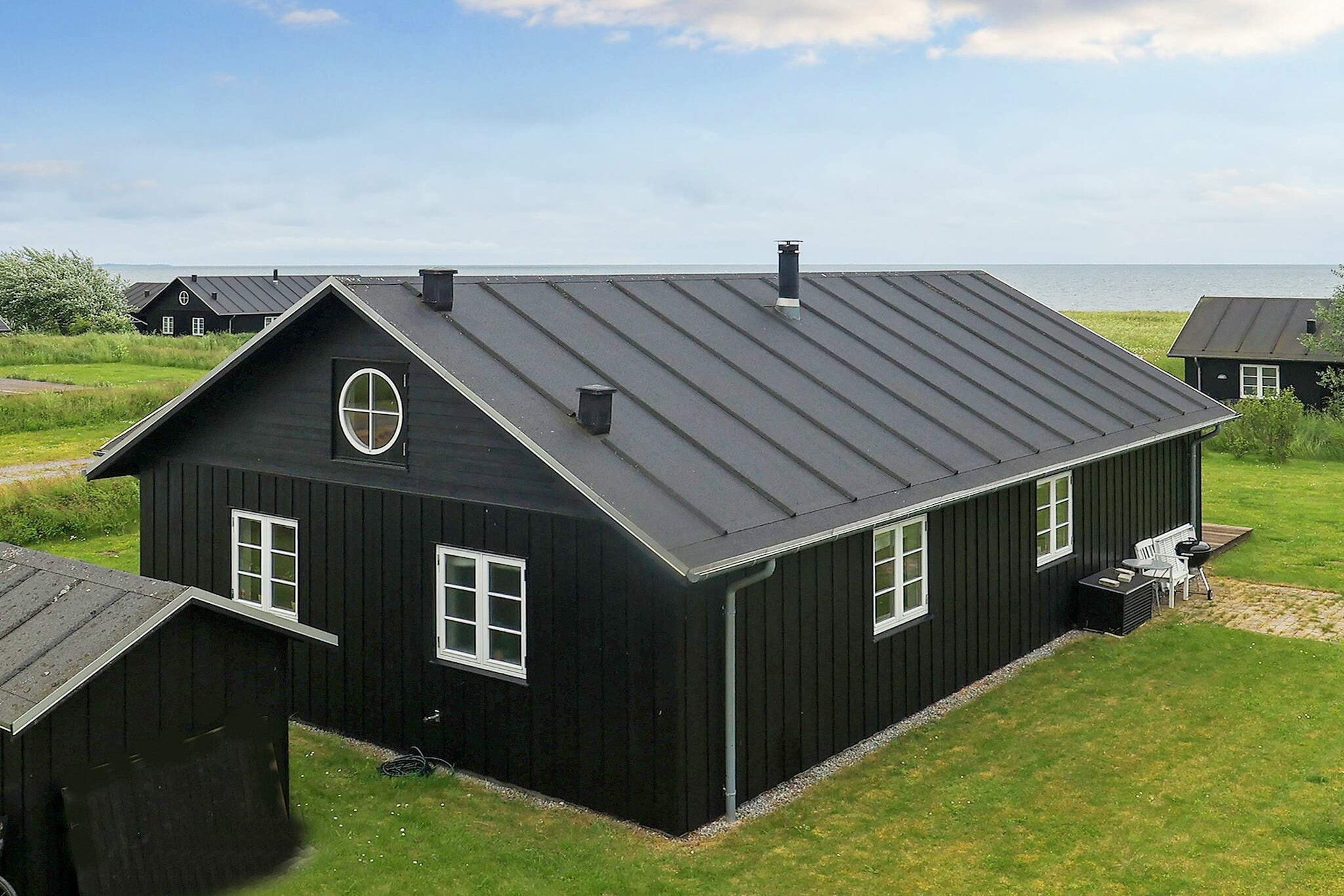 Internet Access DSL, Living room(2x single folding bed), open kitchen(cooker(electric), hood, coffee machine, microwave, dishwasher, fridge-freezer), Living/bed room(TV(cable)), bedroom(double bed), bedroom(double bed), bedroom(2x single bed), bathroom(floor heating)(tumble dryer, bathtub or shower, washbasin, toilet, washing machine), Bubble bath(indoor, heated, 2 persons), sauna(indoor, heated, 3 persons), heating(electric), terrace, terrace(roofed), garden, BBQ, air to air heatpump