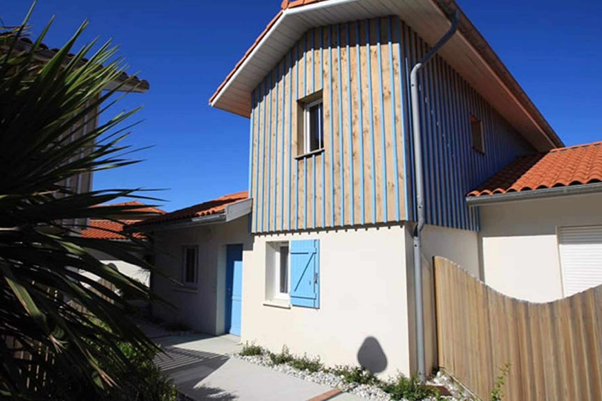 Maison de vacances soignée avec terrasse à 150 m de la plage