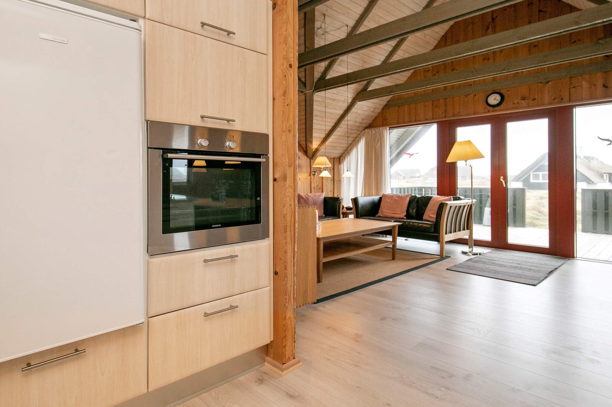 open kitchen(cooker(electric), hood, coffee machine, microwave, dishwasher, fridge, fridge(+ freezer)), Living/bed room(TV, radio), bedroom(double bed), bedroom(double bed), bedroom(2x bunk bed), bathroom(tumble dryer, bathtub or shower, washbasin, toilet, washing machine), heating(electric), terrace