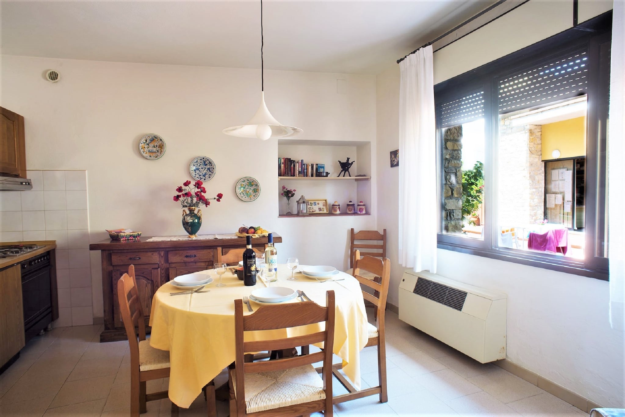 Ground floor: (dining room, Large kitchen(dining table, hob, hood, coffee machine, oven, fridge-freezer, washbasin, Juicer), bedroom(double bed), bedroom(single bed, single bed), bathroom(shower, washbasin, toilet, bidet))\n\npatio, garden, parking, deckchairs, parasol, swimming pool(shared with other guests, 16 x  8 m., opened from May upto and including Sep)