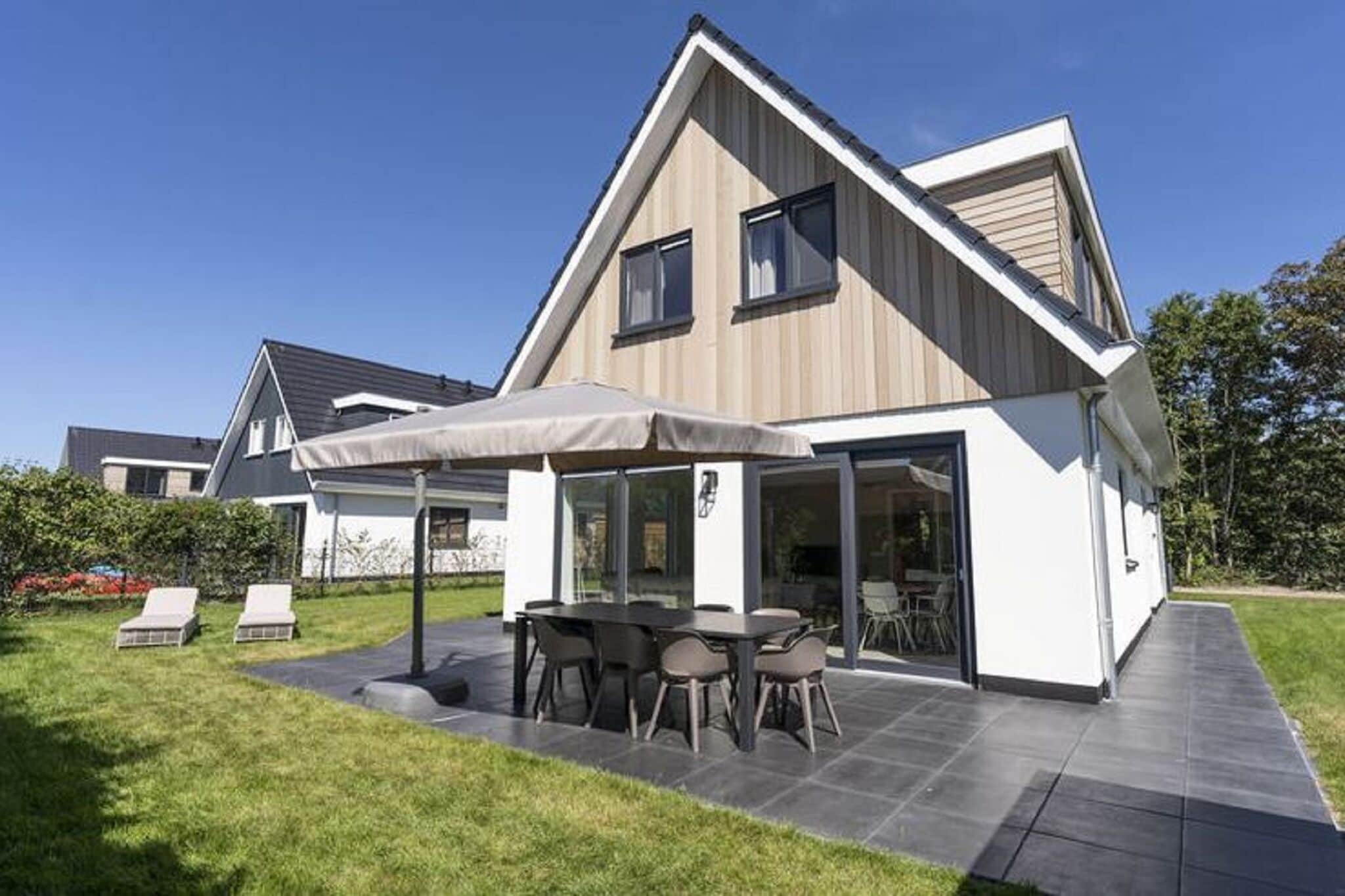 Belle villa avec douche solaire près du Koog sur l'île Wadden de Texel