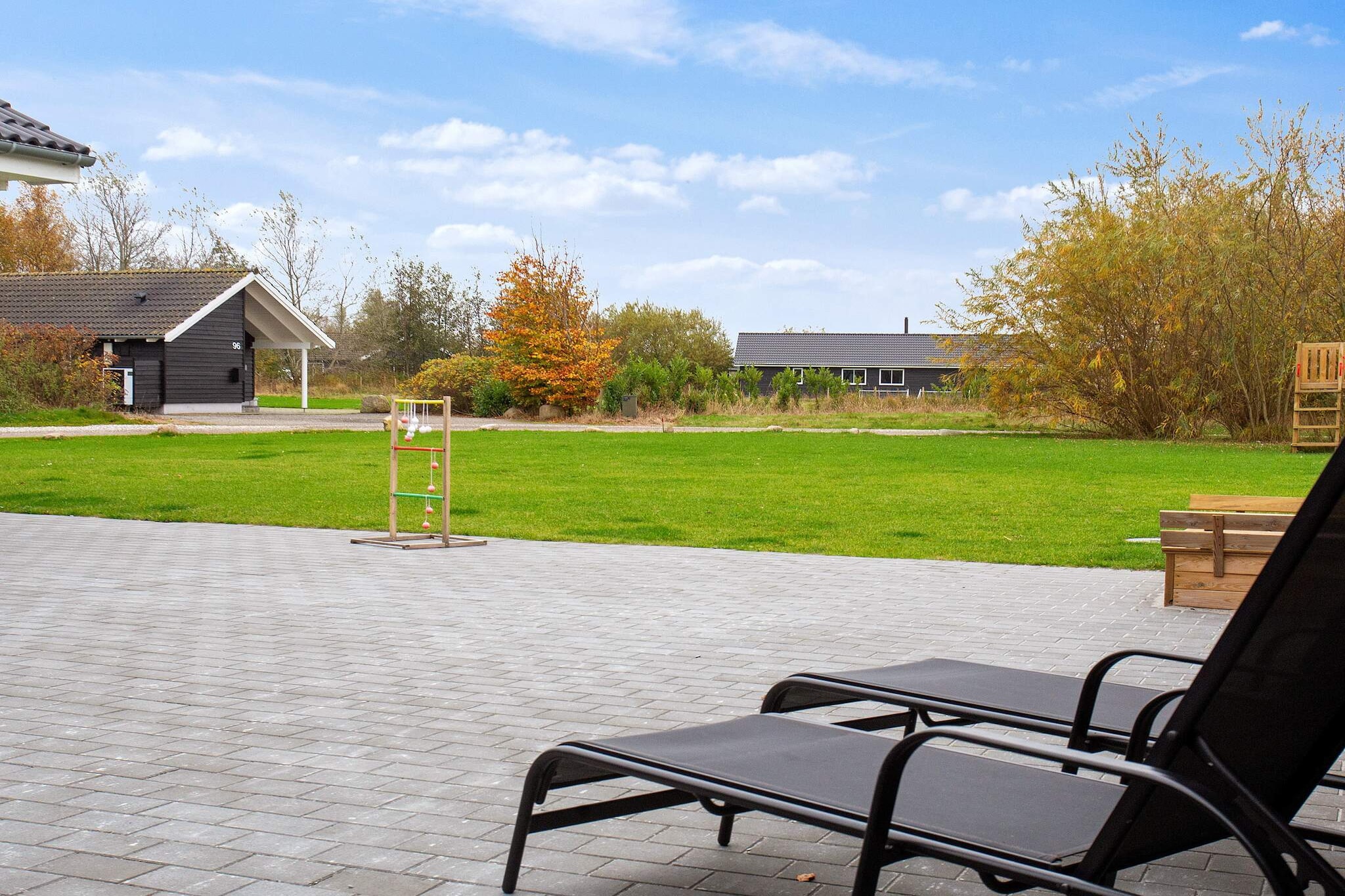 In Marielyst you will find this cottage built in 2020 for 20 people with swimming pool, whirlpool and sauna and many fun both indoor and outdoor activities for the whole family's enjoyment. In the pool area you will find a 20 m2 large swimming pool with water slide, counter-current system, where the children are guaranteed to splash loose. You can also relax in the sauna or enjoy the hot tub bubbles after an active day in the area. The cottage has a large activity room with billiards, table tennis, darts and football games, so everyone can compete in tournaments. In the corner of the sofa you can follow the matches, watch a good movie or play PlayStation4. And at the bar you can grab a cool drink. The cottage's large kitchen has double up on equipment: two ovens, stoves, sinks, dishwashers and refrigerator space, so that cooking and the subsequent cleaning can be done together. The kitchen is connected to the living room, and every man can gather around the long dining table or enjoy himself on the sofa in front of the television. In the kitchen-living room you will find the cottage's wood-burning stove, which warms up on a cool evening with rain and debris. The cottage has eight bedrooms at each end of the house, in addition there are two lofts, one of which has four beds and the other has various play activities. There are four bathrooms, all with shower and underfloor heating. Outdoors on the almost 2800 m2 plot, there is plenty of space to frolic. The children can have fun with the sandbox, swing or play tower or they can jump on the buried trampoline (used at their own risk / insurance). The large terrace has a barbecue and garden furniture, so you can enjoy the sunshine and have nice barbecue evenings. Due to the size of the house, the price of the cleaning of this Skanlux house differs from the normal list price. Settlement of consumption, cleaning and deposit is paid in cash on site to the caretaker. Not for rent to youth groups. Note! Please note that the photos are model photos.