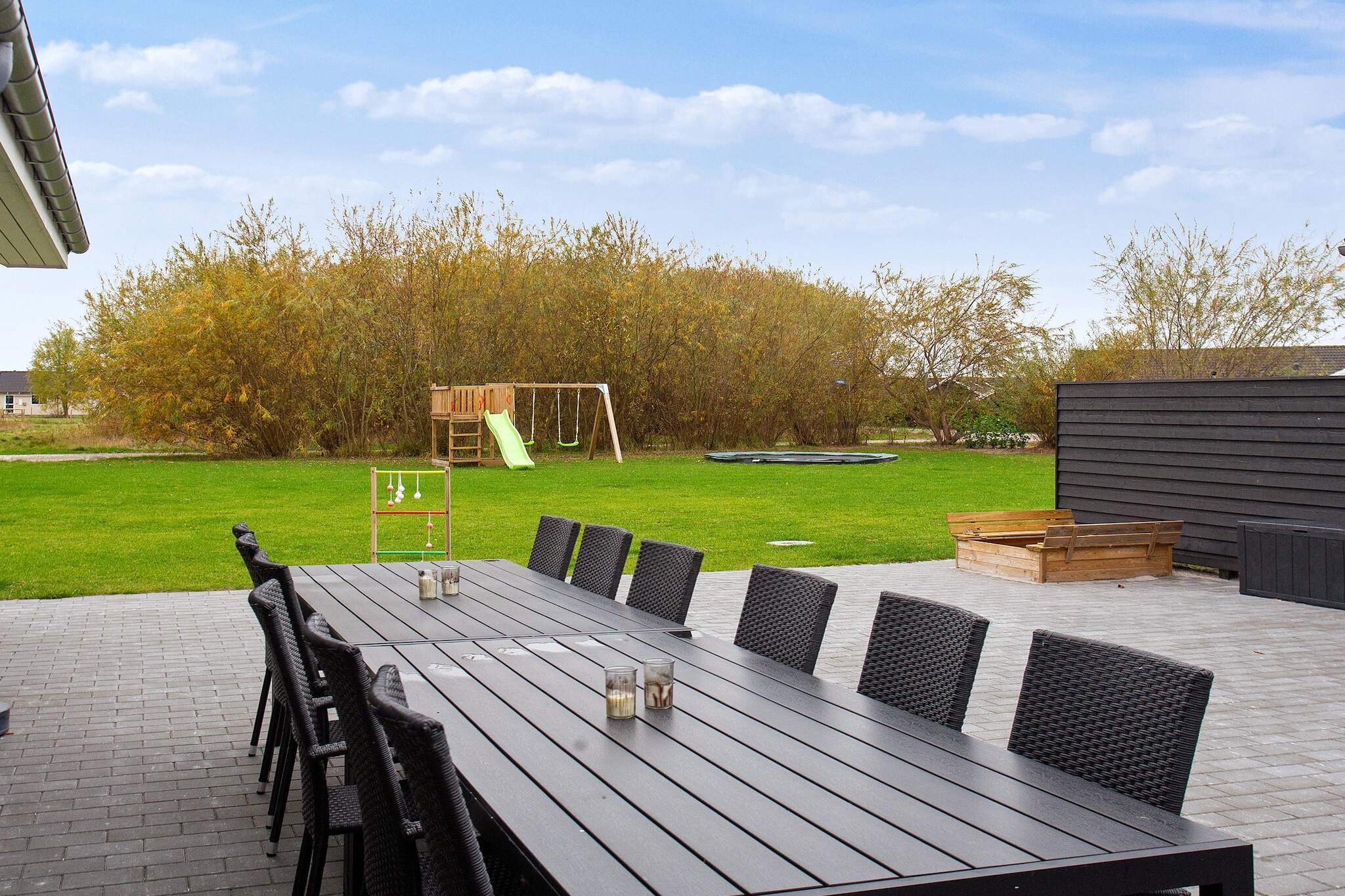 Internet Access DSL, Living room(6x single bed), open kitchen(cooker(electric), hood, coffee machine, microwave, dishwasher, fridge, freezer(200-249L)), Living/bed room(TV(cable, german television channels, danish TV channels (DR1 and TV2)), Blu-ray player, radio, CD player, stereo unit, high chair), bedroom(double bed, cot), bedroom(double bed), bedroom(double bed), bedroom(2x single bed), bedroom(2x single bed), bedroom(2x single bed), bedroom(2x single bed), bedroom(2x single bed), bathroom(floor heating)(tumble dryer, bathtub or shower, washbasin, toilet, washing machine), bathroom(floor heating)(bathtub or shower, washbasin, toilet), bathroom(floor heating)(bathtub or shower, washbasin, toilet), bathroom(floor heating)(bathtub or shower, washbasin, toilet), game computer, Bubble bath(indoor, heated, 4 persons), sauna(indoor, heated, 4 persons), heating(electric), terrace, BBQ, swimming pool(indoor, 200 m2), play equipment, table tennis table, table football, darts, billiards, air to water heatpump