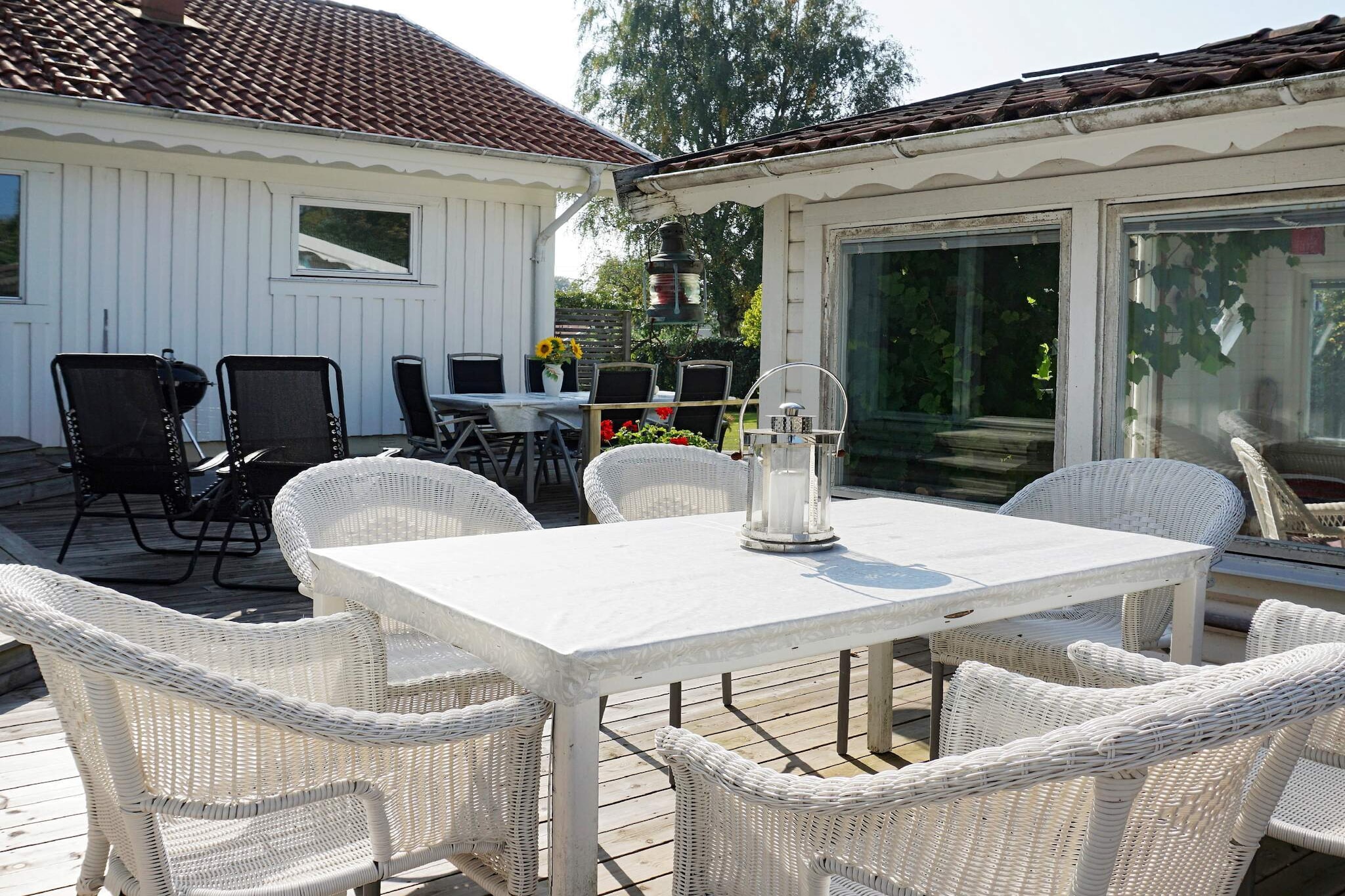 Welcome to this cozy cottage located near the sea in beautiful Ã…sa. Cottage with several balconies, lawn for play and games and a separate conservatory. From here you can reach both Gothenburg's city life with Liseberg or Ullared for the shopping oven within 60 minutes. Large areas both outdoors and inside make the house feel very airy and lovely. The interior is in a modern and robust style. Beautiful large hall with a crystal chandelier that welcomes. Guest toilet with bath and toilet is adjacent to the entrance. A large and spacious well-equipped kitchen with both wine cooler, coffee machine and dining area. Large laundry room inside the kitchen with washer and dryer, ironing board and iron. Living room with sofas, large TV and cozy armchairs in front of the wood burning stove. Another living room is available, decorated in English style, with its own bar counter and warming wood burning stove with club armchairs. Here you enjoy a glass together before dinner after all the day's activities. Here you also come out to a wind-protected terrace with a glazed conservatory decorated with wicker furniture for evening coziness. At the front of the house there are several patios with lounge furniture, dining area and breakfast table in both sun and shade. The cottage has 3 bedrooms. The first bedroom has a double bed - 180cm. Inside there is a private bathroom with corner bath (without bubbles), shower &amp; toilet and sauna for 4 people. The second bedroom has a double bed that is 210 cm. This room also has a rollaway bed (child). In the last bedroom there is a double bed that is 160cm. Adjacent outside the bedrooms is another bathroom with toilet and shower. In the hall there is a sofa bed that can easily be converted into a double bed by pulling out the bed. The owner has 2 additional tent beds. In total, there are 6 regular beds and two more beds in the double sofa bed and 2 extra beds = 10 sleeping places. There are two portable weber grills and a muurikka frying oan that runs on gas. NOTE: be sure to turn it off after each use! In the surrounding areas there are nice shops with everything from gift items, ice cream cafÃ© and home bakery and last but not least Hvita Sand which is a popular restaurant right by the sea. Here you can eat good food or go to Afterbeach in the summer. From GottskÃ¤r you can look at the fishing boats or book a boat trip out to Nidingen. Near the cottage is the beautiful nature reserve Ã–lmanÃ¤s where you can walk and read about the area. Do not forget to make a trip to TjolÃ¶holm Castle where you get guided tours and pleasant experiences. A warm welcome to enjoy your holiday in Ã…sa!