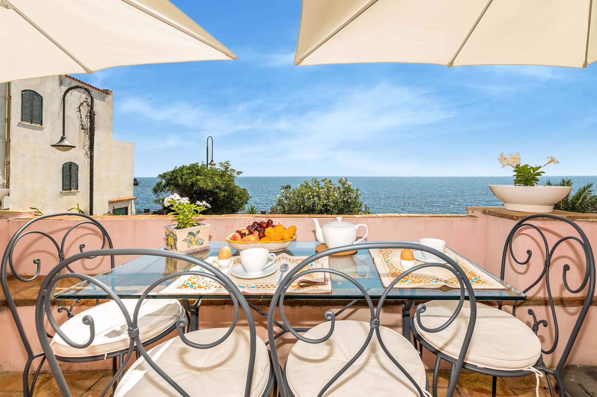 On the 1st floor: (hall, dining room(single sofa bed, TV, dining table, stove, seating area), Large kitchen(electric kettle, boiling water tap, toaster, cooker, hood, coffee machine, espresso machine, oven, waffle iron, microwave, dishwasher, fridge-freezer, washing machine, Juicer, Blender), pantry(ironing board, iron), bedroom(double bed, air conditioning), bedroom(double sofa bed, small double bed, air conditioning), bathroom(shower, washbasin, toilet, bidet), heating)\n\nshower, patio, terrace, garden, garden furniture, sun loungers, parking, deckchairs, parasol