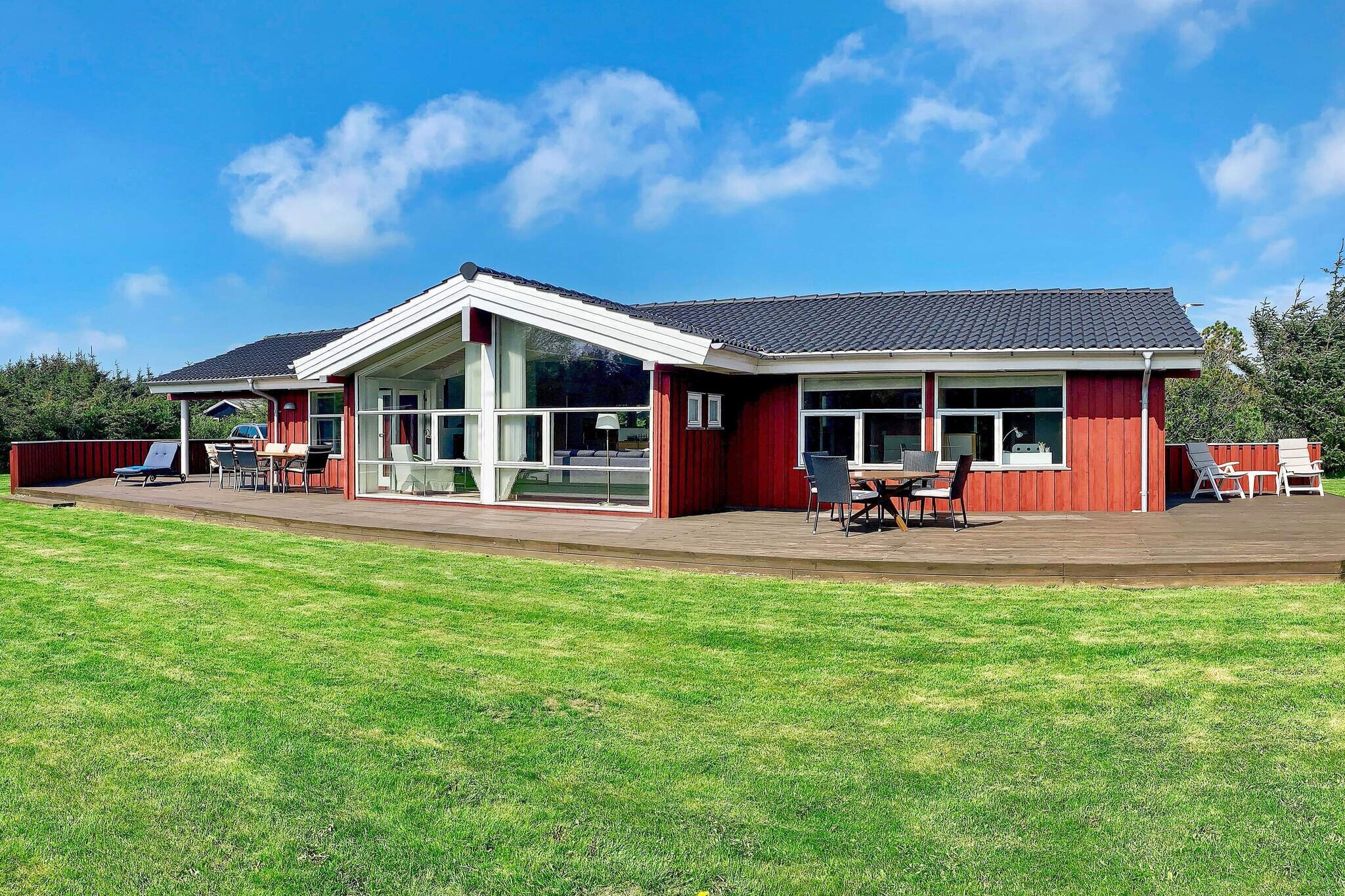 Internet Access DSL, open kitchen(cooker(electric), hood, coffee machine, microwave, dishwasher, fridge-freezer), Living/bed room(TV(cable, german television channels, danish TV channels (DR1 and TV2)), DVD player, radio), bedroom(double bed), bedroom(double bed), bedroom(single bed), bedroom(single bed), bathroom(floor heating)(bathtub or shower, washbasin, toilet, washing machine), bathroom(floor heating)(bathtub or shower, washbasin, toilet), sauna(indoor, heated, 2 persons), heating(electric), terrace, BBQ, football goal