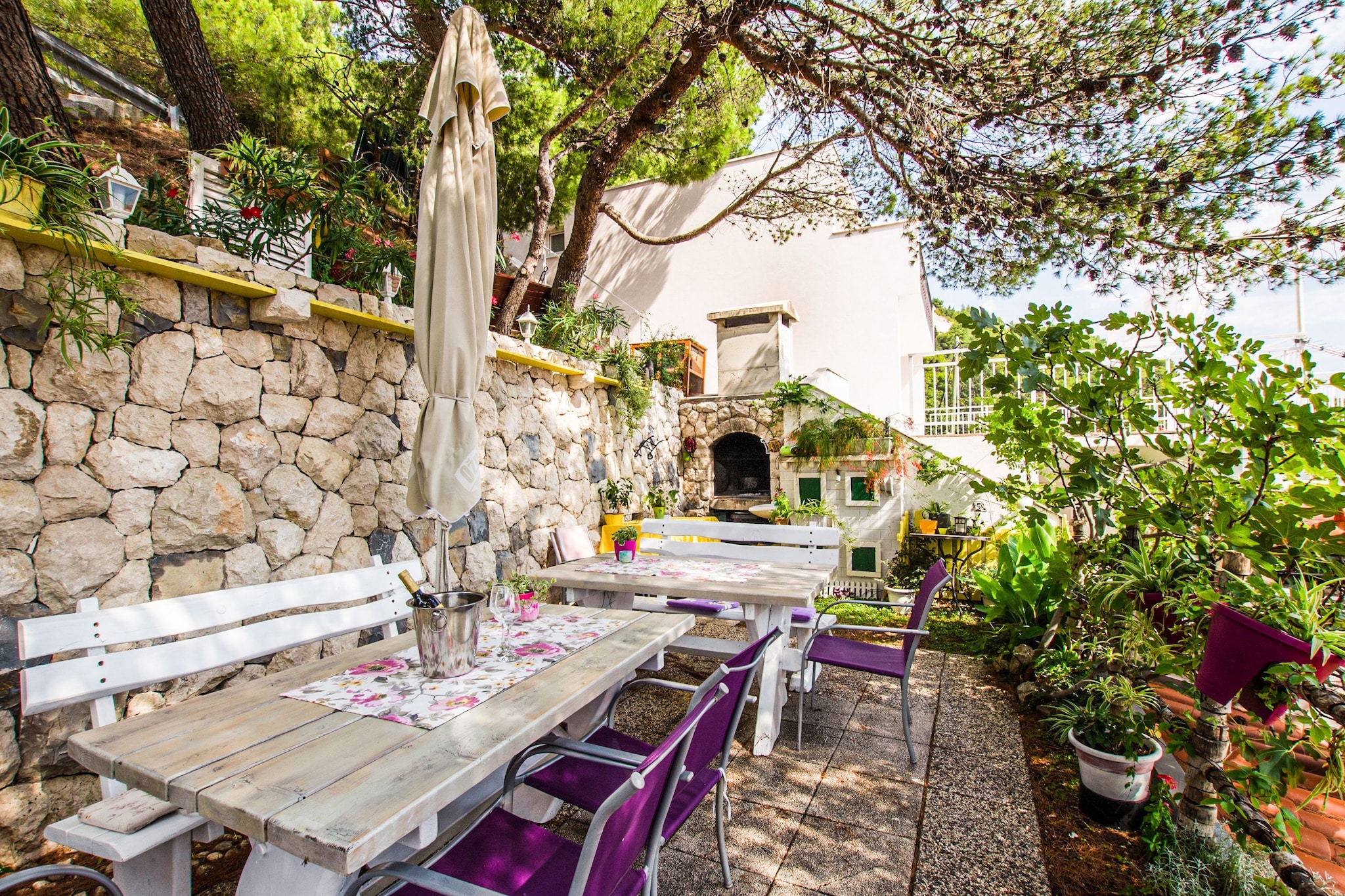 On the 1st floor: (Kitchenette(stove, electric kettle, coffee machine), Living/bed room(double sofa bed, TV(cable, satellite), dining table, seating area), bathroom(shower, toilet), balcony, air conditioning)\n\nopen kitchen(shared with other guests, acces via outside stairway, 24 m2)(seating area, grill), parking