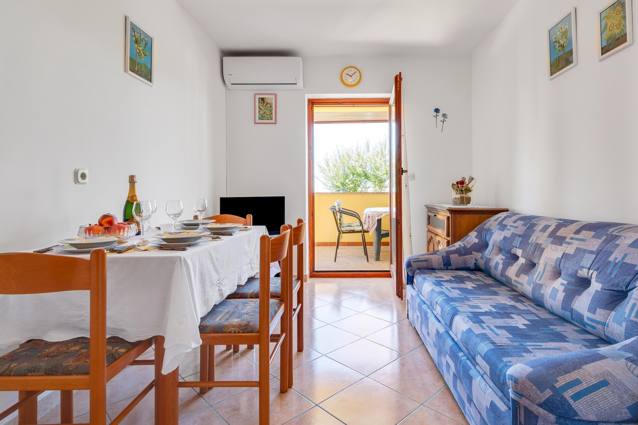 This apartment for four guests offers a comfortable and well-equipped retreat in Poreč, a charming coastal town in Istria. With free WiFi, a private terrace, and a lush garden, this stay is perfect for travelers seeking relaxation and convenience. The air-conditioned interiors ensure comfort, while the on-site parking adds to the ease of exploring the surroundings.

Inside, the apartment features a welcoming living and dining room with a double sofa bed, TV, and seating area, a fully equipped kitchen with a hob, electric kettle, hood, coffee machine, oven, and fridge, and two bedrooms with double beds. The bathroom includes a shower, washbasin, toilet, and bidet, ensuring a refreshing experience. Guests can also enjoy the barbecue area, perfect for outdoor dining.

Nearby, Poreč Old Town showcases stunning medieval architecture, while Baredine Cave offers breathtaking underground formations. Explore the Church of Our Lady of the Angels, a historic landmark in the town center. For dining, Konoba Daniela, just 7.8 km away, serves delicious Istrian cuisine. Whether exploring history or savoring local flavors, this apartment is the perfect getaway.