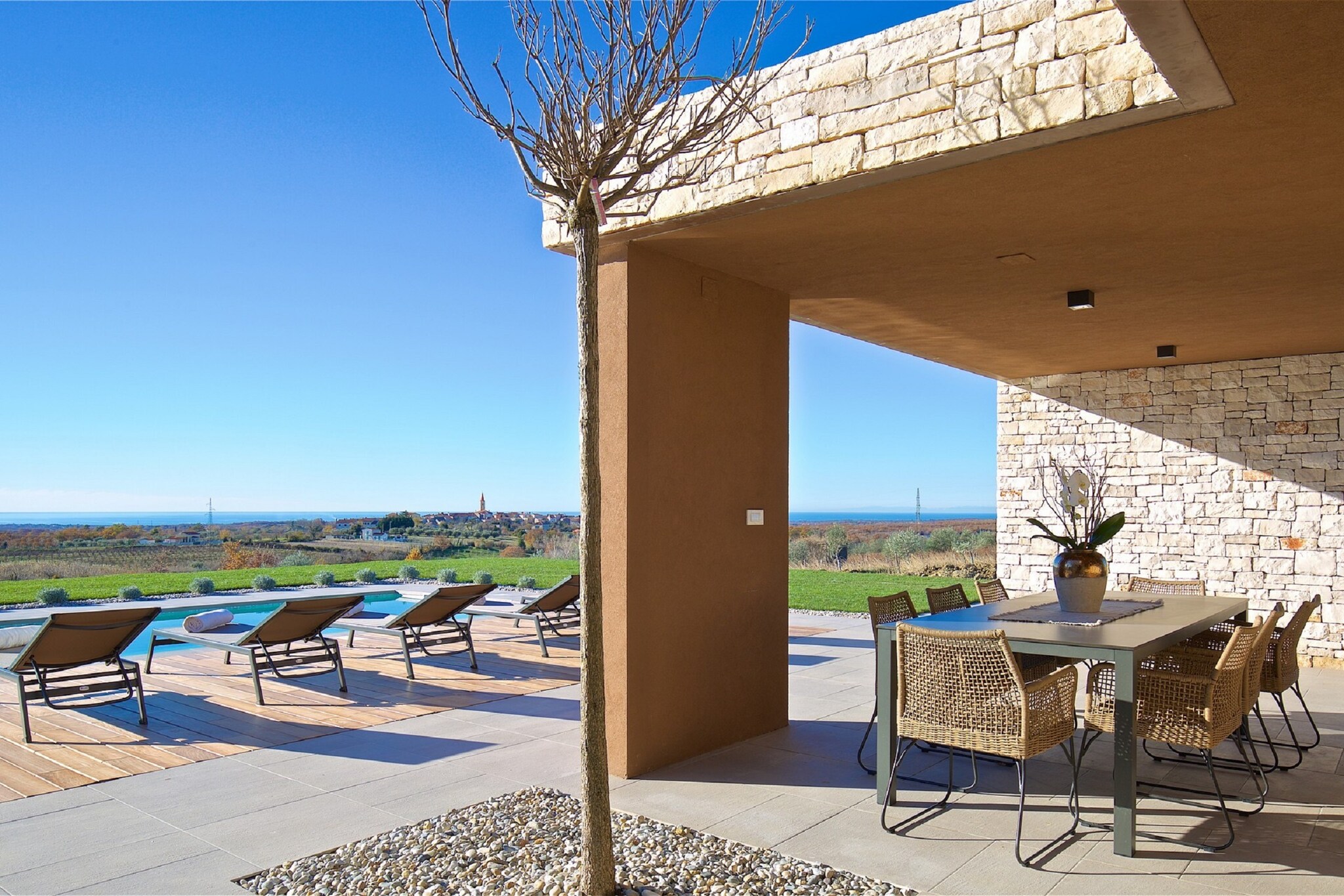 This premium holiday home in Brtonigla, equipped with a bubble bath and a sauna this place is an ideal stay for a relaxing vacation. The house has 6 bedrooms that can accommodate 15 people of a family or a group comfortably. 

About Belvilla

When you stay in a Belvilla home, you can rest assured of a unique holiday home in ideal surroundings at an attractive price. The portfolio of accommodations consists of more than 40,000-holiday homes in 20 European countries. Interested in a weekend getaway, a summer or winter sports holiday or simply a short break? Do you prefer the coast, the countryside or the mountains? Whatever your preference, there is a Belvilla home to meet your needs, from a cosy gîte for two to a castle big enough for the entire family, from an apartment in the heart of Rome to a cabin in the middle of nowhere, from a simple tree house to a luxury dream villa and from close to home to the other side of Europe.

A Belvilla home gives you the freedom to enjoy breakfast in your pyjamas or continue a good conversation into the morning hours without having to worry about the bar's closing time. Prepare gourmet meals with fresh local ingredients in your own kitchen and take advantage of having your own swimming pool to do as many cannonballs as you want! In other words, you can enjoy complete privacy in your home away from home.