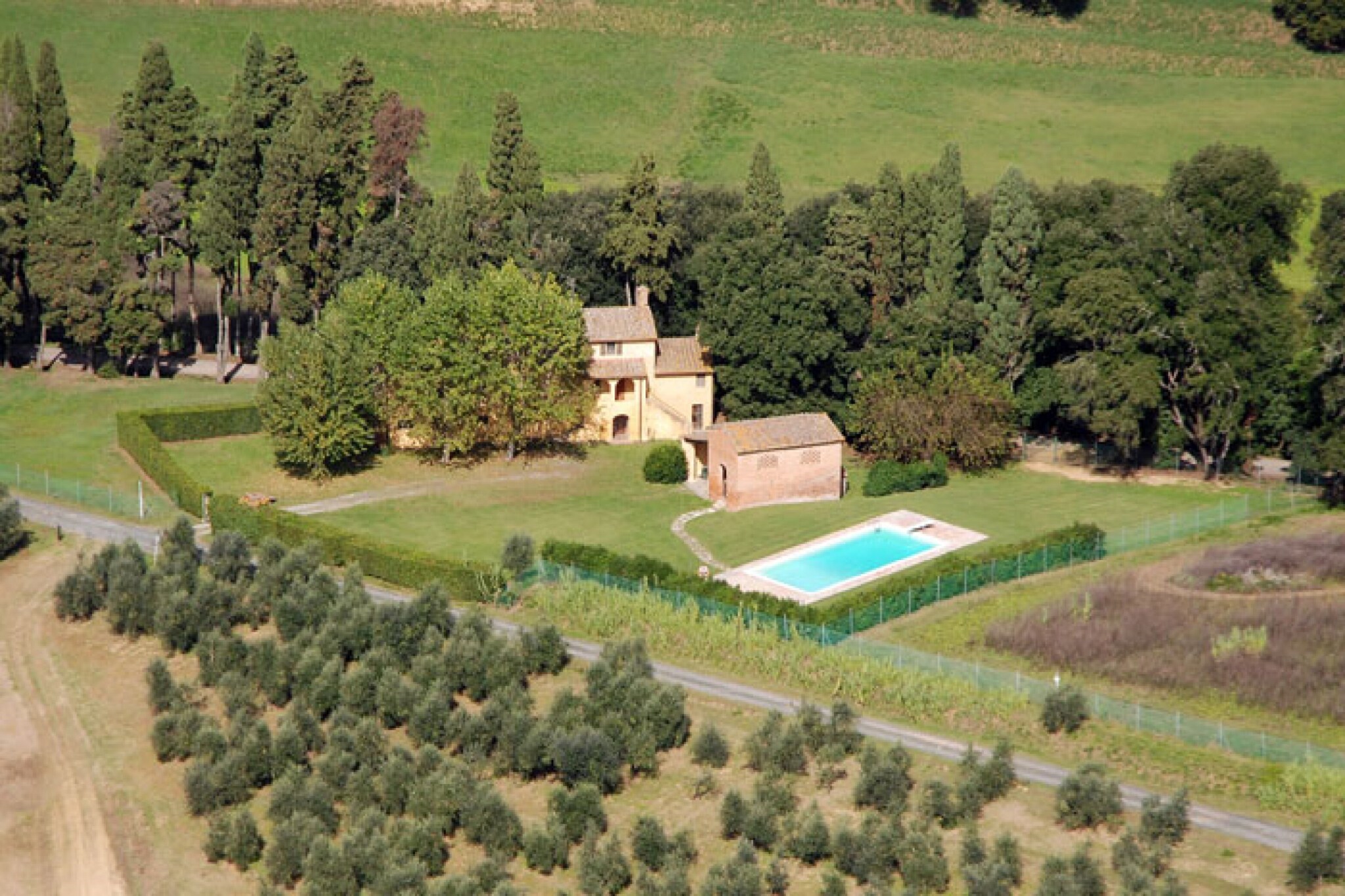 This tranquil abode in Ponsacco with 4 bedrooms for 8 people is based comes with all comfortable and luxury furnishings. With a swimming pool and a fenced furnished garden for taking a refreshing dive and relaxing, this home is best suited for a family with children or groups. 
Restaurants can be found a short stroll away at 0.2 km. A bakery at Capannoli 3 km will satiate all your sweet cravings, while general supplies can be found a bit farther.
 In case you have a car, do drive down to Castelfalfi at 25 km to enjoy a game of golf, while sun and sand greet you at the Tirrenia Beach at 40 km. 
The cities of Lucca and Firenze lie 63 and 66 km away and can also be explored. Barbecue to your heartÂ’s content or else put the oven to good use. The recreation room keeps both children and adults busy with adequate play equipment and party games. Washing facilities are available as well. The nearest train station lies 12 km away in Pontedera. Pisa Airport is 29 km away.
Swimming pool open from May to October.