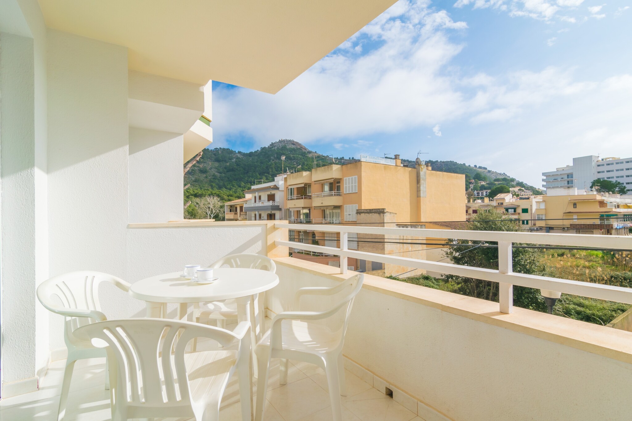 A relaxing breakfast will be granted at the cosy and handy terrace of this great apartment. You can get the energy you need here, while watching the calm daily life of the streets in Canyamel. Next, you can head to the beach to spend a great day. The best thing is that this is located a short walk of 250 metres away!
This first floor, without lift, offers a comfortable and functional room combining kitchen, dining room and living room. Here you can also relax on the sofa, watching SAT-TV, accompanied by the air conditioning (only cold air), after enjoying the delicious dishes prepared on the electric cooker. Please note that the kitchen equipment is basic and there is no washing machine, iron or ironing board available. There are two bedrooms with two single beds, air conditioning (cold air only) and wardrobe. One room has space for a cot and high chair, and the second room has access to a small terrace. The extra bed can be accommodated on the sofa bed. The bathroom has a shower.
Canyamel is a beautiful and quiet residential area in Capdepera with one of the best beaches in the area. It offers all needed services for your stay like supermarkets, bars and restaurants and the golf course also is near, about 7.2 km. The Caves of Srtà and the Tower of Canyamel are a must visit of the area. Consult the advertiser for possible charges. Pets are not allowed. The holding of events is forbidden.
Distances
Beach: 0.25 km - Canyamel
Airport: 72.6 km - Son Sant Joan
Golf course: 7.2 km - Golf Canyamel
Town: 0 km - Canyamel
Train station: 27.2 km - Manacor
Bus stop: 0.035 km - Canyamel
Ferry: 43.3 km - Puerto de Alcúdia
Hospital: 25.6 km - Hospital de Manacor
Tourist license: AT/1535The Ecotasa (tourist tax) must be paid cash on site when checking in. The amount varies between 0.55€/night and guest during the low season and 2.2€/night and guest during the high season. The tax is reduced by half from the 9th day of your stay. All guests have to pay the Ecotasa, except people under 16 years. You will have to pay the deposit amount at the arrival to the owner.Homerti - Central de Reservas CR/33
