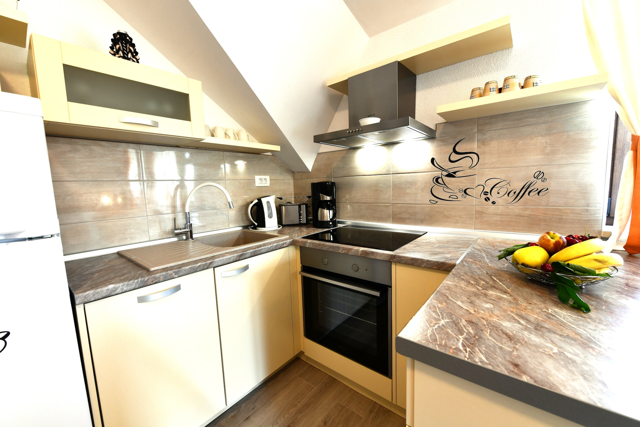 Attic: (open kitchen(toaster, cooker, coffee machine, oven, microwave, dishwasher, fridge, freezer), Living/diningroom(double sofa bed, TV, dining table, seating area), bedroom(double bed), bathroom(shower, washbasin, toilet, washing machine))\n\nbalcony, heating, air conditioning, garden furniture, BBQ, parking, trampoline, play equipment, party games, Garden shed