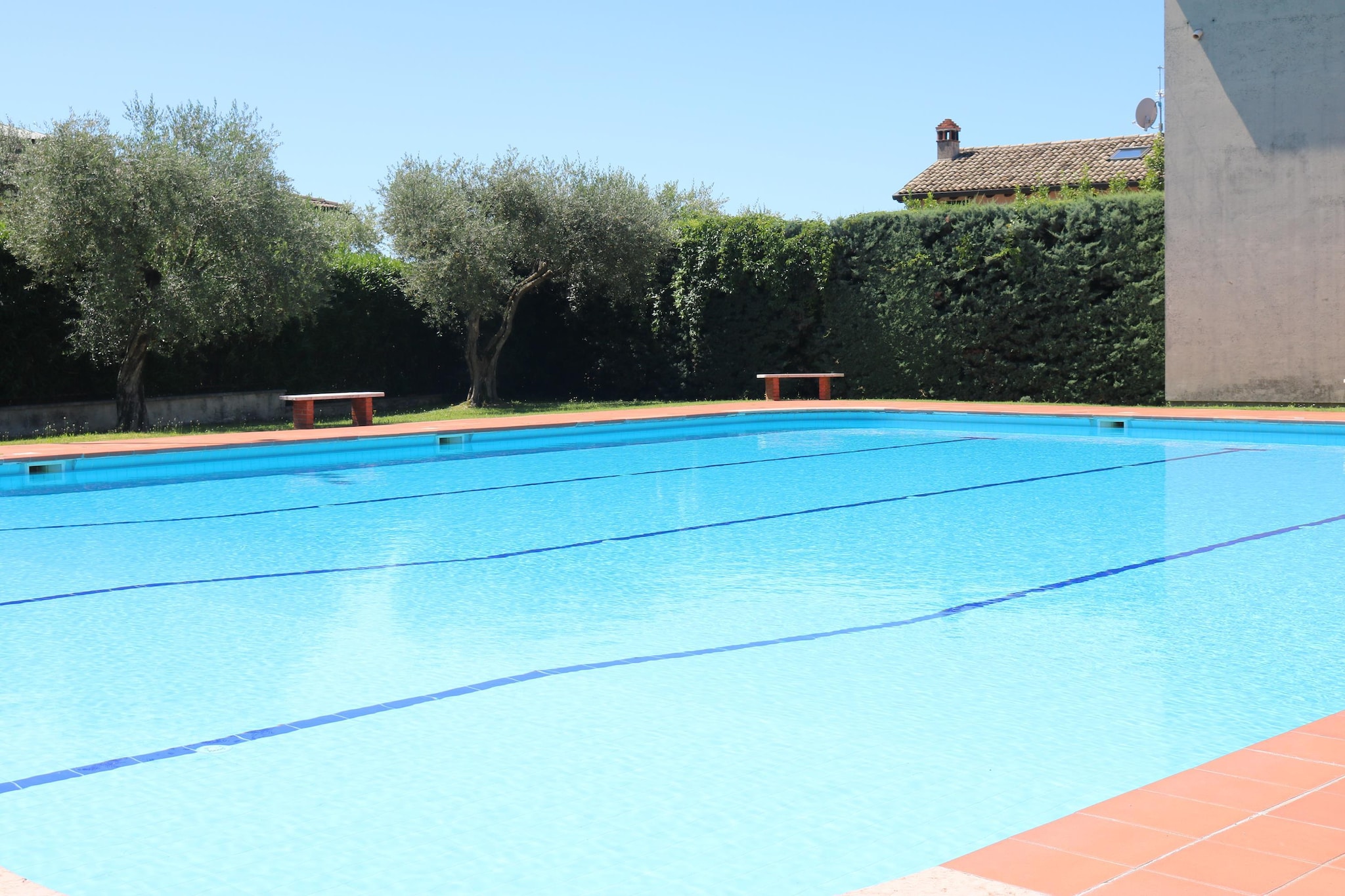 Ground floor: (Kitchen(hood, oven, microwave, dishwasher), Living/diningroom(TV(flatscreen)), bedroom(double bed), bedroom(double sofa bed), bathroom(shower))\n\nheating, terrace(private, roofed), garden(shared with the owner , landscaped garden, 800 m2), garden furniture, parking, swimming pool(shared with other guests, opened from 1/2 May upto and including 1/2 Sep)