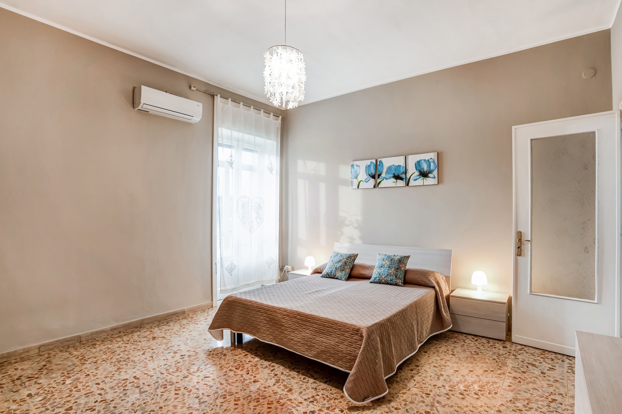 Ground floor: (Entrance, lift)\n\nOn the 3rd floor: (Entrance, hallway, hall, Living room(dining table, seating area), Large kitchen(electric kettle, hood, coffee machine, espresso machine, oven, fridge-freezer, balcony), bedroom(double bed, balcony, air conditioning), bedroom(single bed, double sofa bed, TV, balcony, air conditioning), bedroom(double bed or 2 single beds, balcony), bathroom(shower, washbasin, toilet, bidet, washing machine, hairdryer))\n\nchildren\'s bed, ironing board