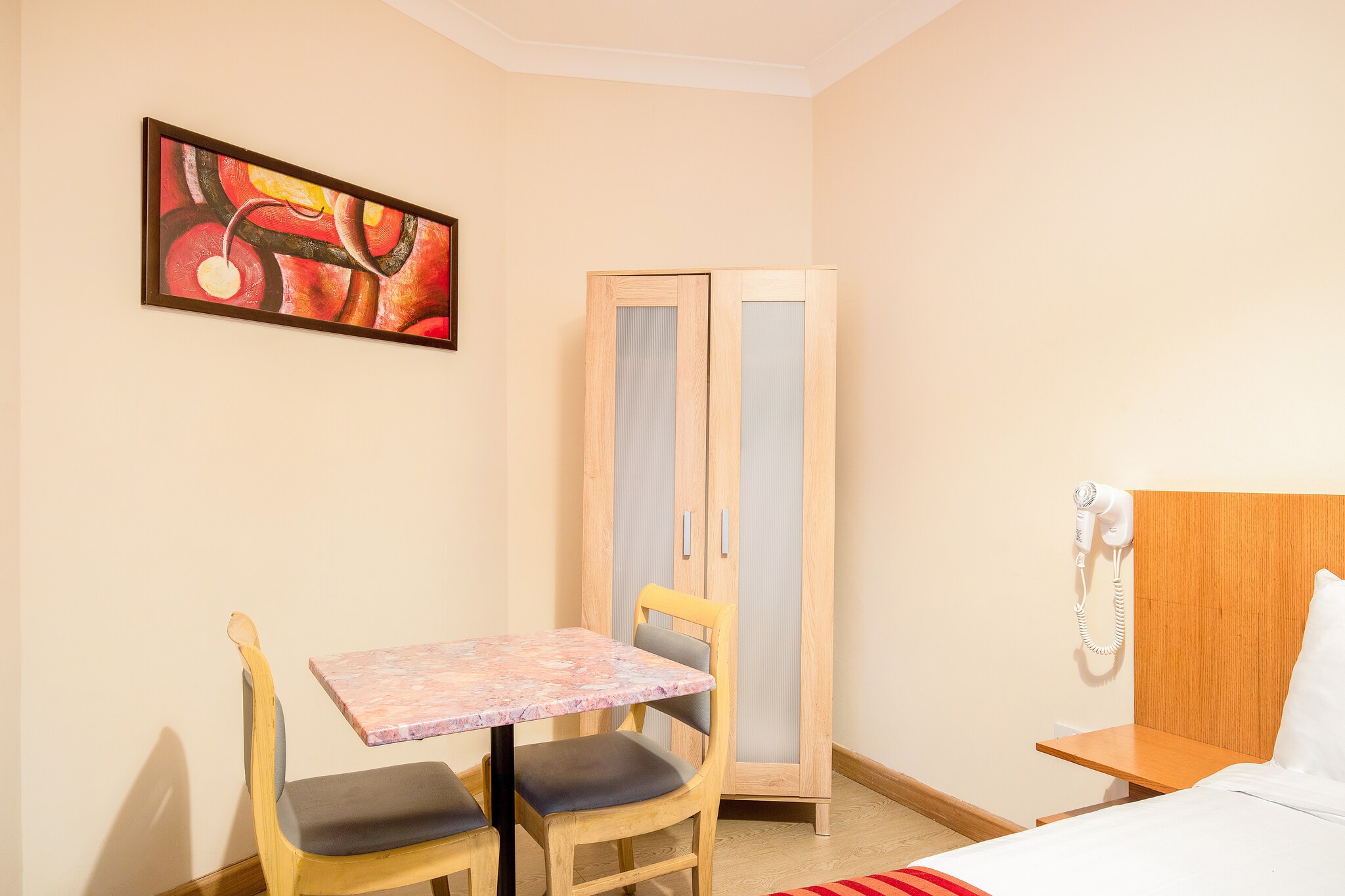 Ground floor: (Entrance, hallway, Kitchenette(electric kettle, combination microwave, fridge), Living/bed room(double bed, TV, dining table), bathroom(shower, washbasin, toilet))\n\nheating