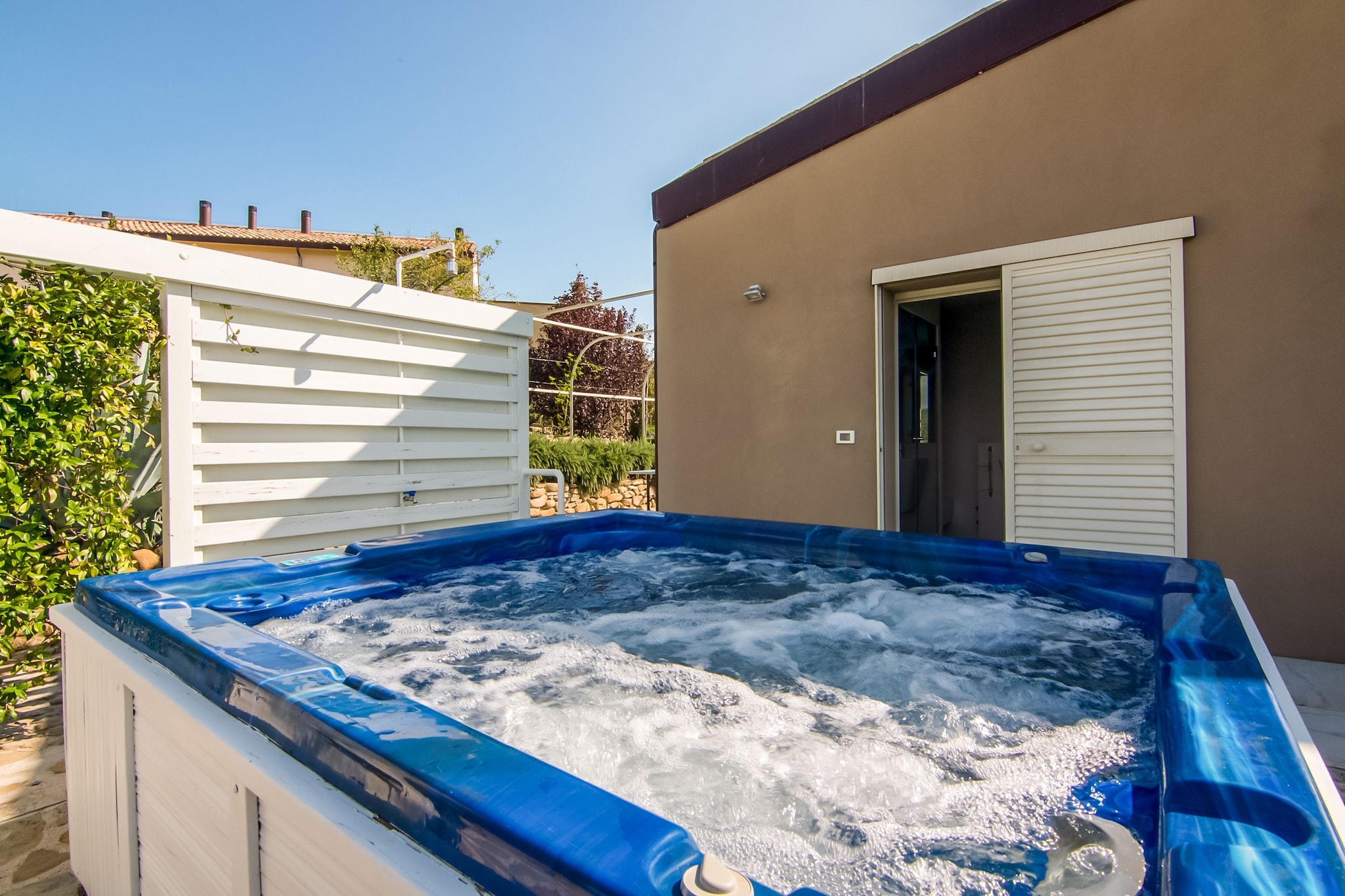 This spacious apartment in Montefiore Conca offers a serene countryside escape for up to nine guests, with a fully equipped kitchen, cozy sitting room, and a mix of single and double beds across two floors. Three bathrooms, including one with disabled access, ensure comfort for all, while a private terrace and insect screens enhance the peaceful ambiance.
Outdoors, guests can enjoy a wood-fired kitchen, a veranda dining area, and a lush garden with sun loungers, a hot tub, and a bubble bath. Entertainment includes table tennis and a lounge set, while nearby attractions like Cattolica’s beaches, Aquafan Riccione, and the Onferno Caves offer adventure and natural beauty.
Local dining is a highlight, with standout options like Locanda il Grillo, Locanda San Pietro, and La Buona Fattoria serving traditional Emilia-Romagna fare. For rustic charm, try Ostaeria Gatta e Gazzoia, Falsariga, or Trattoria Gracco. Trattoria Adriana and Corrado Ristorante San Clemente round out the culinary experience with regional specialties and warm hospitality.