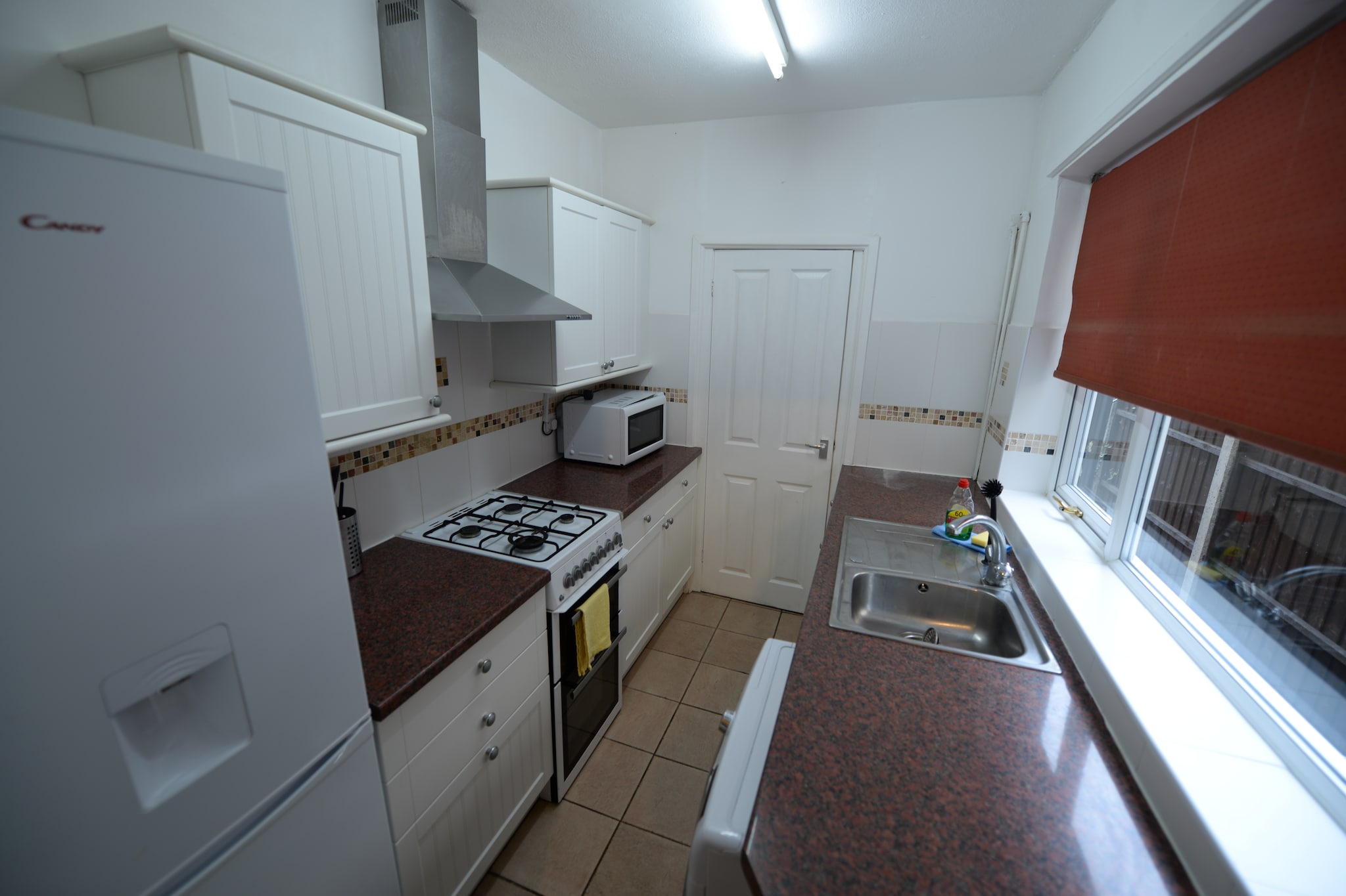 An optional utilities and service fee of GBP 70,00 will be charged before your arrival. Details are given below.<br> This peaceful apartment in Coventry offers a perfect stay for a large family with children or a group of 8 people. With 1 bedroom on the ground floor and second floor each and 2 bedrooms on the first floor, this home has a fully-fitted kitchen to prepare delicious delicacies for your loved ones and washing and heating facilities as well. SkyDome arena lies 3.5 km from the home and is a fabulous multiplex offering various avenues for entertainment. Catch a live performance of your favourite plays at the Belgrade Theatre 2.6 km away. FarGo village at 1.5 km is another shopping centre where you can buy souvenirs and such. Students will find the Coventry and Warwick Universities only 1.4 km and 11 km away from their stay. Supermarkets lie a short stroll away and restaurants lie only 2 km away. There are 4 bathrooms in the property and a double bed for sleeping peacefully in every bedroom. A smart TV in the living/dining room will keep you entertained. Coventry Airport is 5 km away. <br><b> Optional Utilities & Service Package </b><br><b> An optional utilities and service package of GBP 70,00 </b> can be selected prior to your arrival. You will receive a separate communication with the payment link should you wish to include it.<br>This package ensures a seamless stay and conveniently covers services such as final cleaning, utility consumption, service support, and protection against minor damages or incidental costs during your stay.<br>Guests who prefer may manage these services independently, provided the property is returned in good order at check-out.