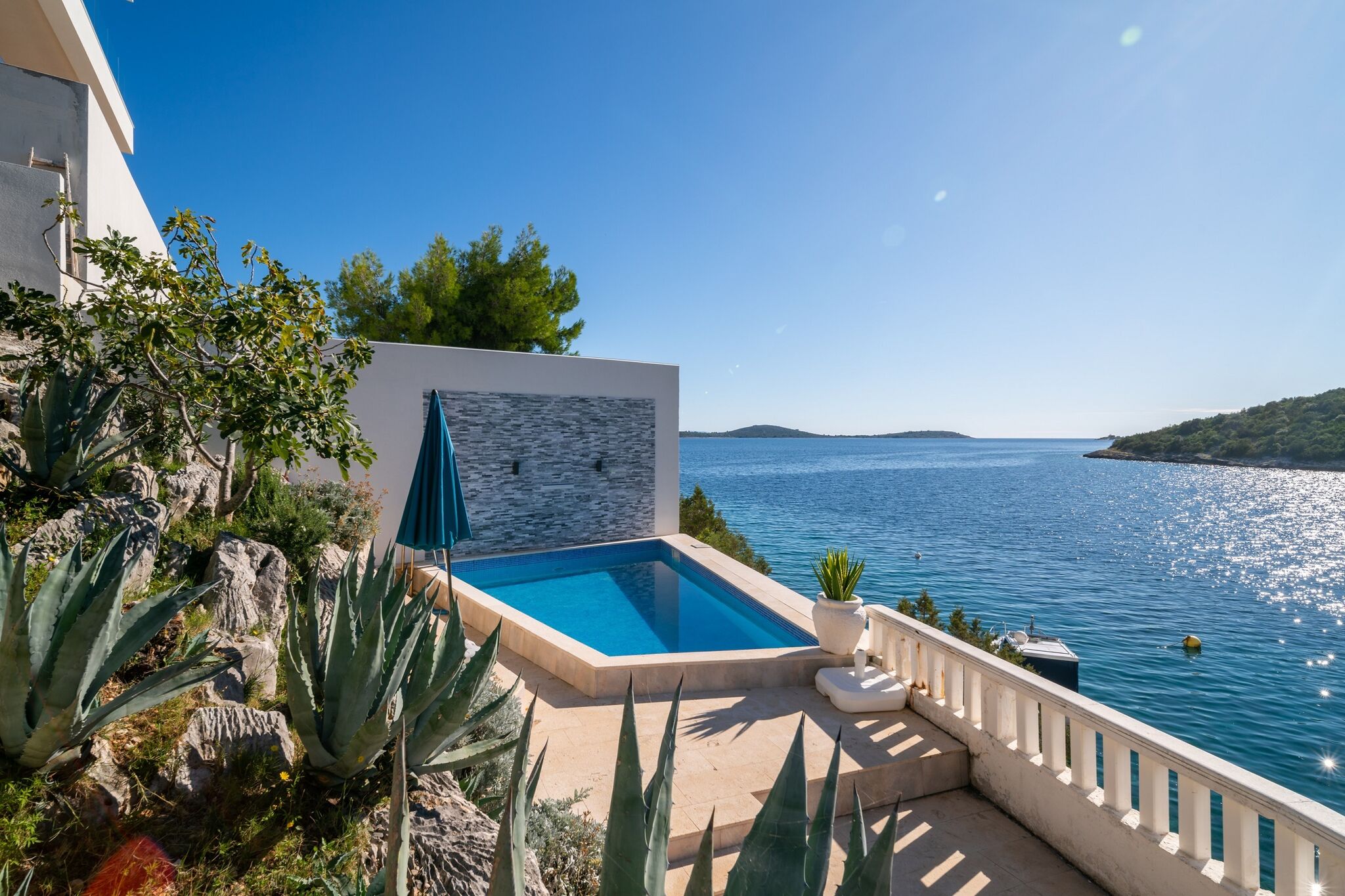 Villa Sine with private pool and a sea view, located 50 m from the beach in Vinišće