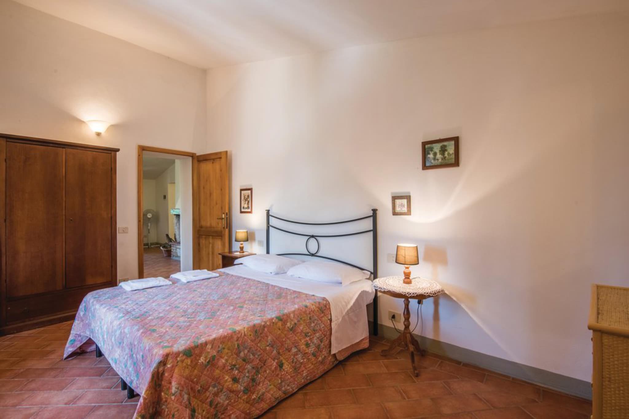 On the 1st floor: (Living room(double sofa bed), Large kitchen(TV(satellite), dining table, fireplace, hob, hood, coffee machine, fridge-freezer), bedroom(double bed), bedroom(double bed), bathroom(shower, washbasin, toilet, bidet), bathroom(shower, washbasin, toilet, bidet))\n\nwashing machine(shared with other guests), garden(shared with other guests, landscaped garden, 3000 m2), garden furniture, swimming pool(shared with other guests, 17 x  6 m., opened from May upto and including Oct)