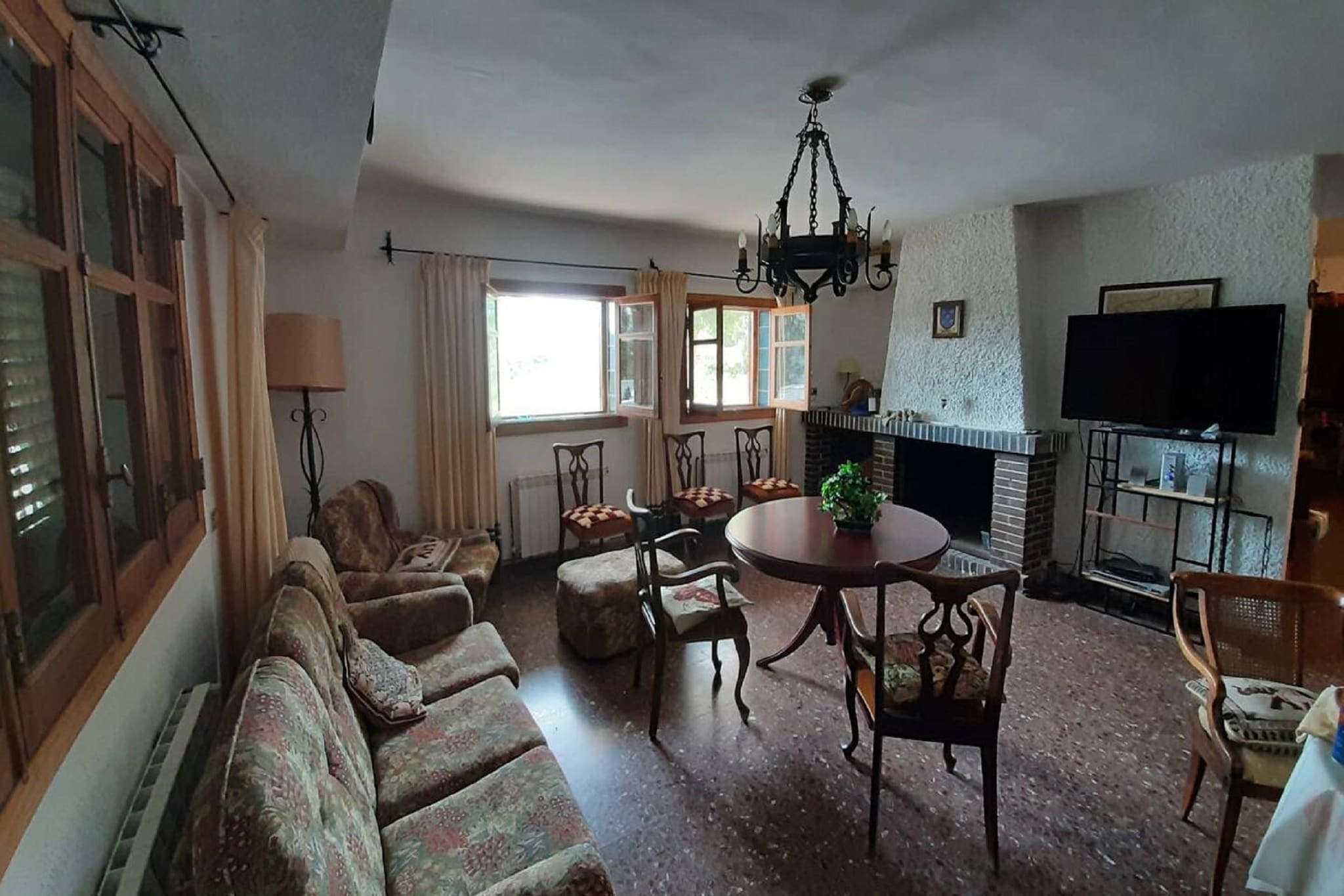 Charming Villa Retreat
This spacious villa offers a welcoming stay for families or groups, featuring a private swimming pool and a beautifully landscaped garden. Relax on the terrace with comfortable lounge furniture or take a refreshing dip in the pool to start your day. The outdoor barbecue area is ideal for evening meals under the Valencian sky, while multiple seating areas provide perfect spots for reading, socialising, or enjoying the serene surroundings. Pets are not allowed, ensuring a calm environment for all guests.

Comfortable Living Spaces
Inside, the villa is designed for both comfort and convenience. The ground floor includes a large living room with a fireplace, TV, and cosy seating areas, plus a fully equipped kitchen with modern appliances to prepare your favourite meals. The dining space opens onto the terrace, creating a seamless indoor-outdoor experience. With multiple bedrooms across three floors, including a gallery bedroom and a double sofa bed, there is plenty of space for everyone. 

Valencia Adventures Nearby
The villa is located near Valencia, a city rich in culture and gastronomy, while also offering a peaceful countryside setting perfect for hiking and nature walks. Wine enthusiasts can visit the historic Bodega Vanacloig nearby, while the beaches of Valencia are just over an hourâ€™s drive. Local restaurants and markets offer authentic Valencian cuisine, making it easy to explore flavours from the region.