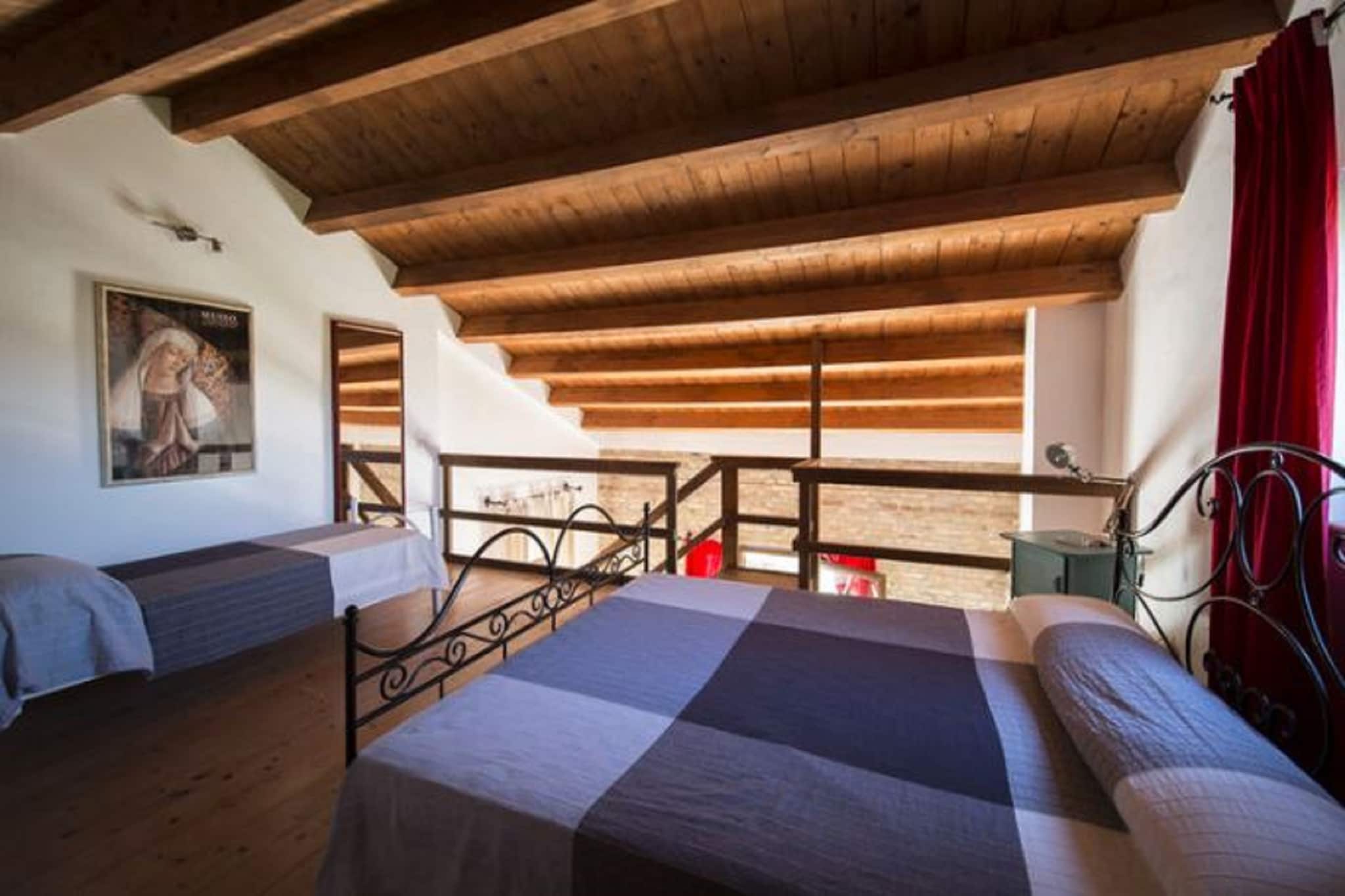 Ground floor: (open kitchen(stove, toaster, microwave, dishwasher, fridge-freezer, washing machine), Living/diningroom(TV, dining table, fireplace, seating area), bathroom(Bubble bath, washbasin, toilet, bidet), air conditioning, terrace(private, 16 m2))\n\nmezzanine: (bedroom(single bed, double bed), bathroom(washbasin, toilet, bidet))\n\ngarden(private), garden furniture, BBQ, parking, swimming pool(shared with other guests, outside), swimming pool(shared with other guests, outside)