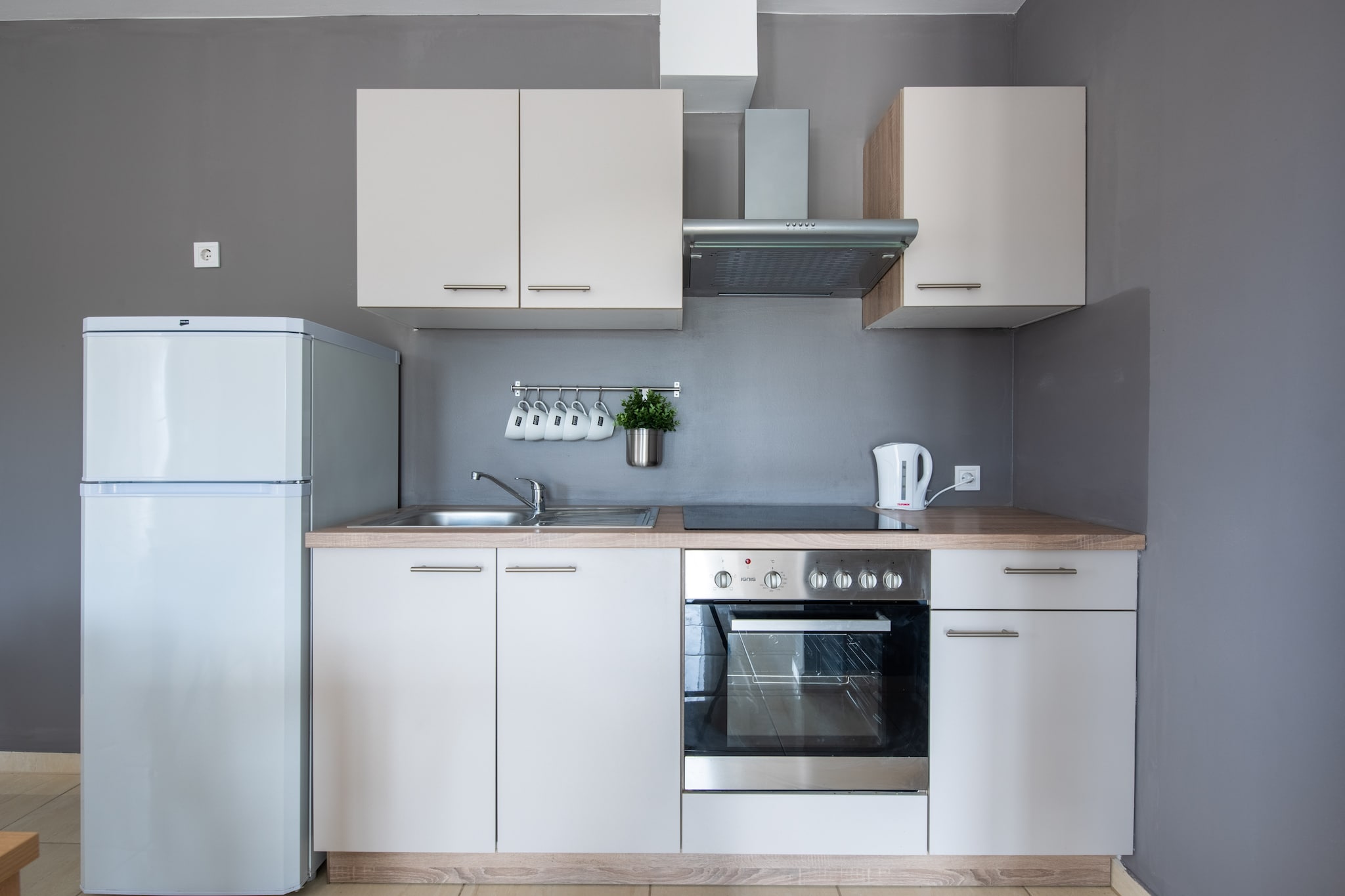 Ground floor: (Kitchen(dining table, electric kettle, cooker, coffee machine, oven, fridge-freezer), Living/bed room(double sofa bed, TV(flatscreen, satellite), seating area), bedroom(double bed), bedroom(single bed, single bed), bathroom(shower, washbasin, toilet))\n\nair conditioning, BBQ(shared with other guests), parking, ironing board, iron, hairdryer