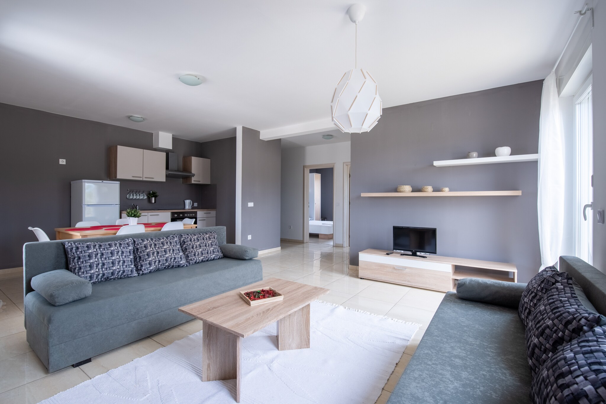 This beautiful and modernly-decorated 2-bedroom apartment for 4 guests is situated on the island of Pag. You have a barbecue, shared with other guests, for relishing grilled items of your choice and parking facility which will keep your cars safe and scratch-free.
The seabeach will greet you with its waves only 0.6 km away, post which you can indulge in a fun game of tennis 1 km away. Trg Loža town centre at 0.7 km will cheer you up with its bustling crowds and numerous avenues. The town of Novalja is also known for its nightlife where many festivals take place. On the island of Pag, you can visit many sights, try local food and local wine. We suggest that you visit Pag cheese shops, Pag salt shop and buy Pag lace as a souvenir to bring home.
Notably, this property consists of multiple guesthouses. Airconditioning is available and 1 pet is allowed to stay on the property for a small fee.
Zadar Airport is 84 km away.