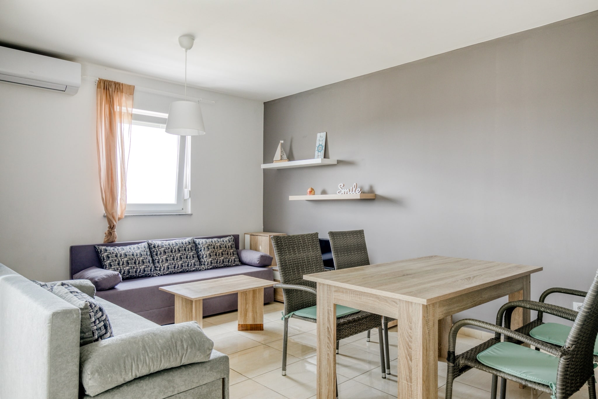 Located in Novalja, this apartment can accommodate 4 people in a bedroom as well as a living cum dining room which has a double folding bed. Balcony makes for a spot where you can admire the ebb and flow of deep blue waters. Ideal for a family, kids are also welcome here.
Beach can be reached after an amble, where you can admire the shore or get a tan. Trg Loža Town Centre lies a hop away, where you can enjoy the local culture, enjoy the food, fill on your essentials. ZrÄe beach is a treat to the eyes and can be reached after a drive. We suggest that you visit Pag cheese shops, Pag salt shop and buy Pag lace as a souvenir to bring home.
Air-conditioned apartment keeps the temperature indoors controlled and moderate. Barbecue is another amenity to keep your trip happy and delicious. Parking will keep your car safe and secure. Kitchen with an oven, cooker and fridge will make sure that you have a seamless experience.
Zadar Airport lies 84 km away.
About Belvilla
When you stay in a Belvilla home, you can rest assured of a unique holiday home in ideal surroundings at an attractive price. The portfolio of accommodations consists of more than 40,000-holiday homes in 20 European countries. Interested in a weekend getaway, a summer or winter sports holiday or simply a short break? Do you prefer the coast, the countryside or the mountains? Whatever your preference, there is a Belvilla home to meet your needs, from a cosy gîte for two to a castle big enough for the entire family, from an apartment in the heart of Rome to a cabin in the middle of nowhere, from a simple tree house to a luxury dream villa and from close to home to the other side of Europe.
A Belvilla home gives you the freedom to enjoy breakfast in your pyjamas or continue a good conversation into the morning hours without having to worry about the bar's closing time. Prepare gourmet meals with fresh local ingredients in your own kitchen and take advantage of having your own swimming pool to do as many cannonballs as you want! In other words, you can enjoy complete privacy in your home away from home.
