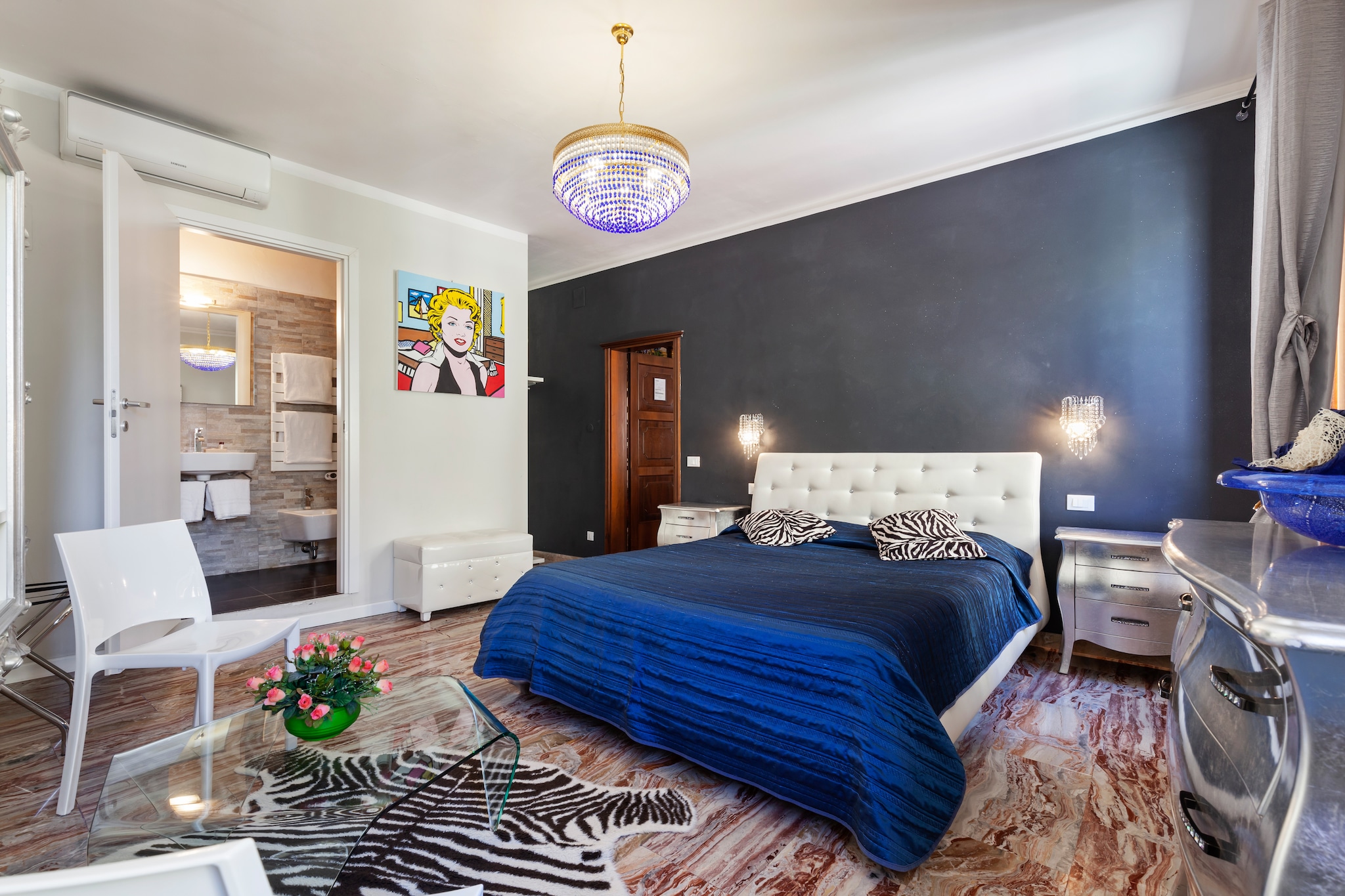 On the 1st floor: (Living room(dining table, seating area), Large kitchen(oven, microwave, dishwasher, fridge, washbasin), Bedroom with bathroom(double bed or 2 single beds, TV, Bubble bath, shower, washbasin, toilet, bidet), Bedroom with bathroom(single bed, bunk bed, TV, shower, washbasin, toilet, bidet), Bedroom with bathroom(double bed or 2 single beds, TV, shower, toilet))\n\ndining table, balcony or terrace